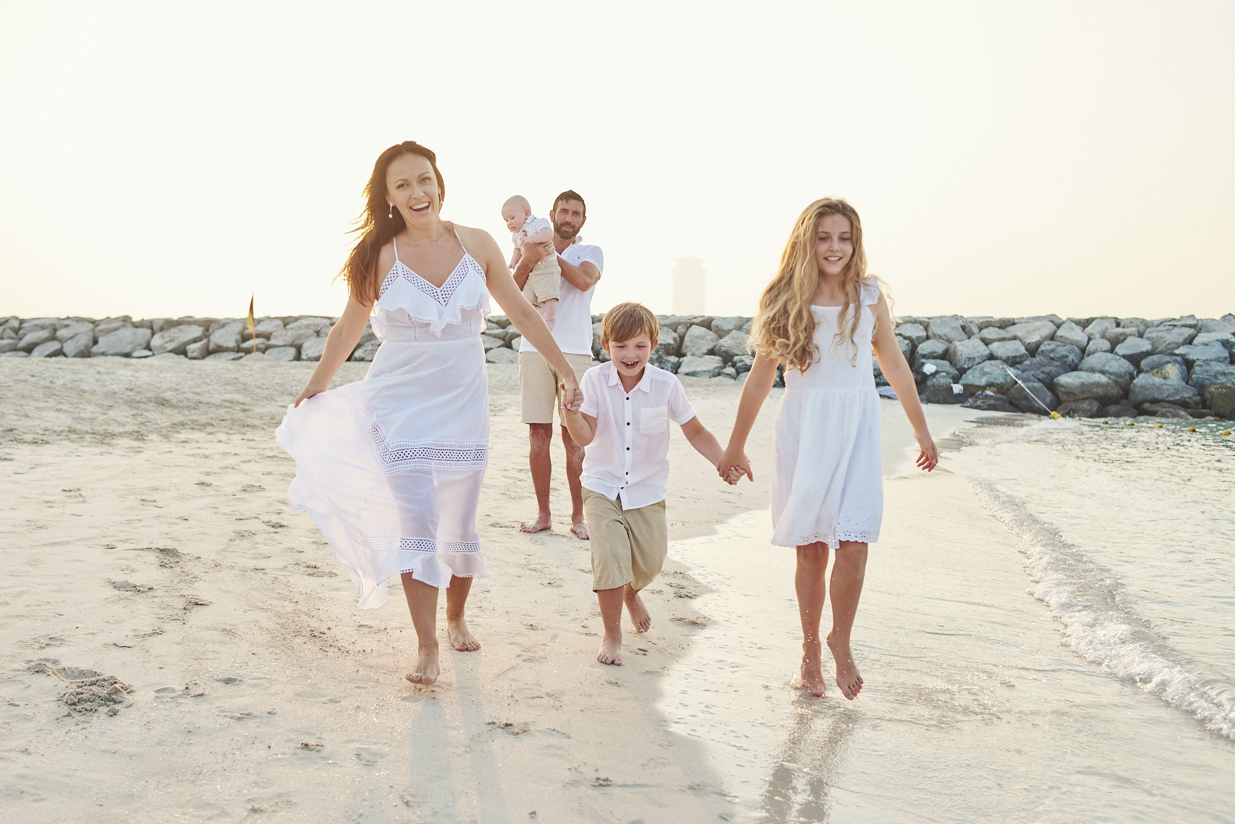 Family photo shoot on sunset at the Dubai beach