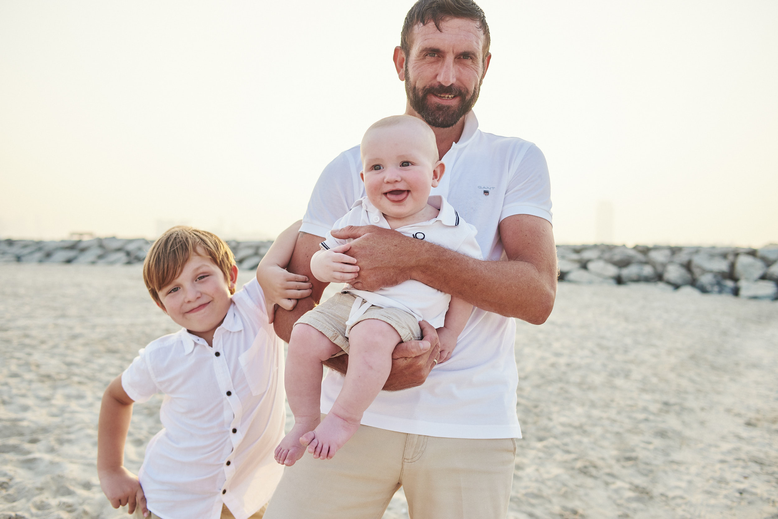 Family photo shoot on sunset at the Dubai beach