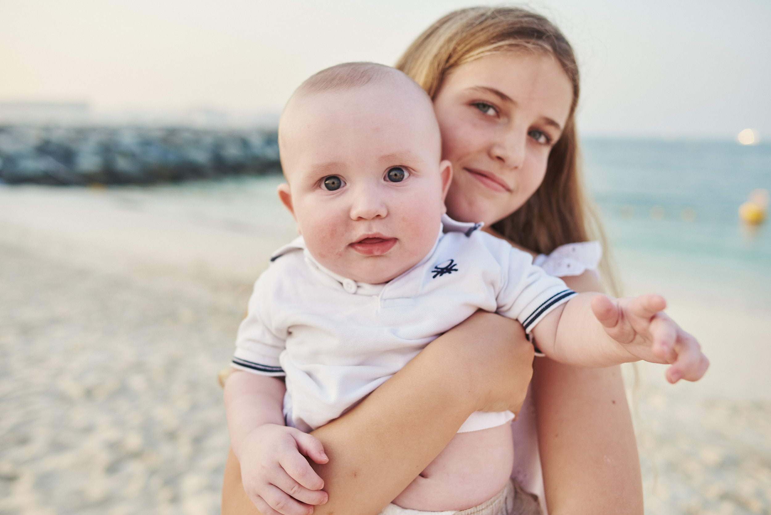 Family photo shoot on sunset at the Dubai beach