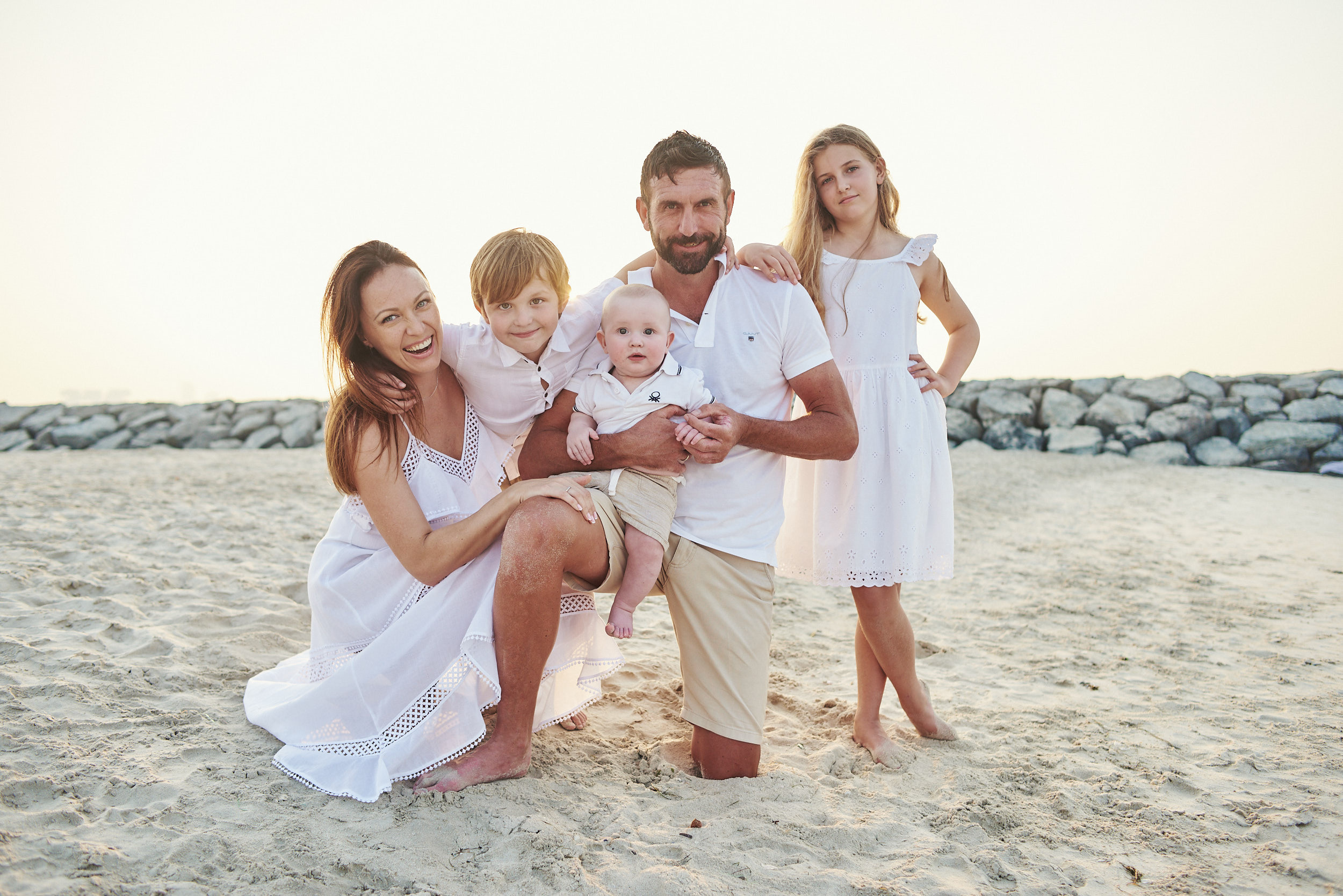 Family photo shoot on sunset at the Dubai beach