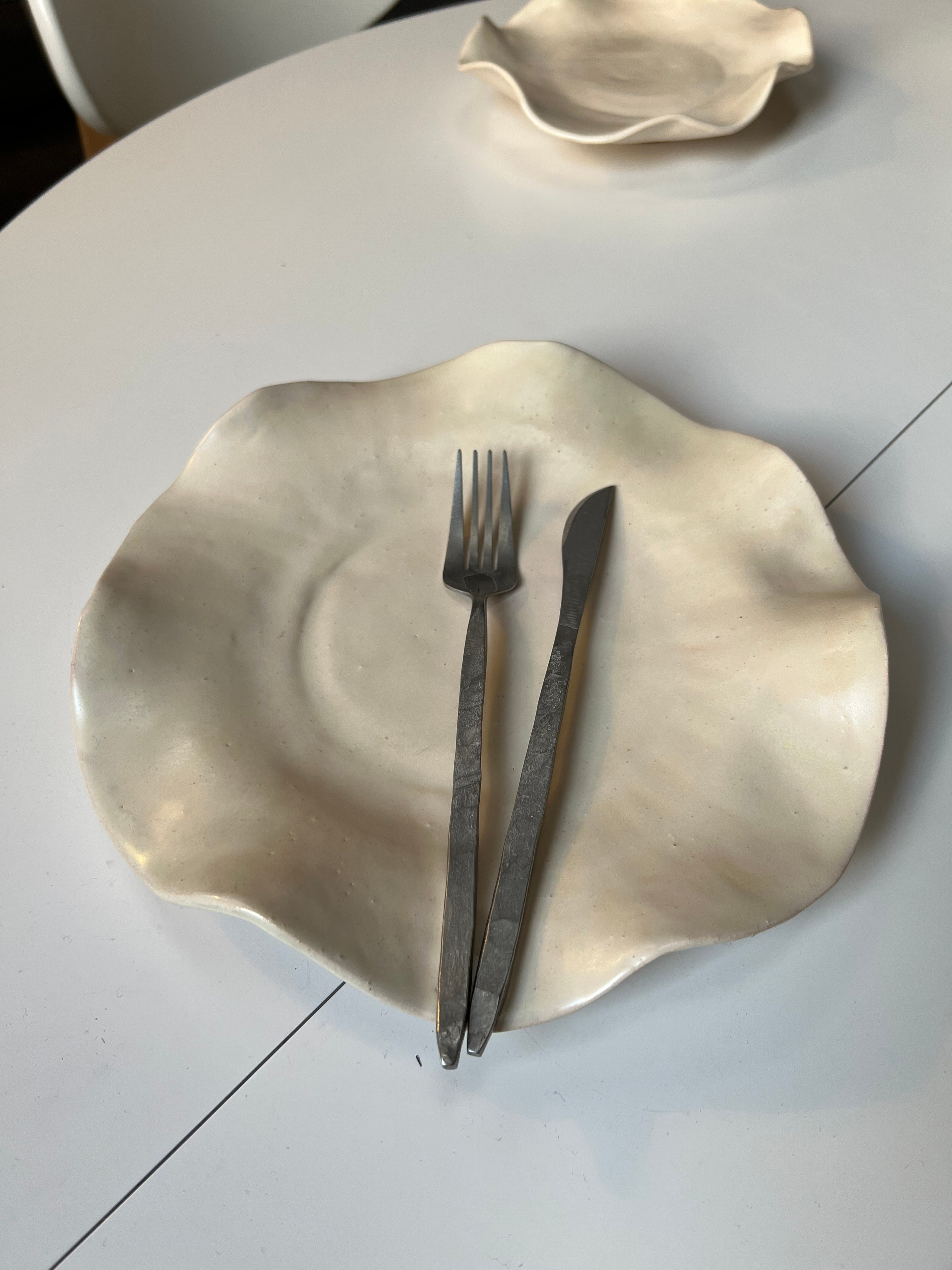 Plate. ReefCeramics, based in Nicosia, is a creative hub where handcrafted ce