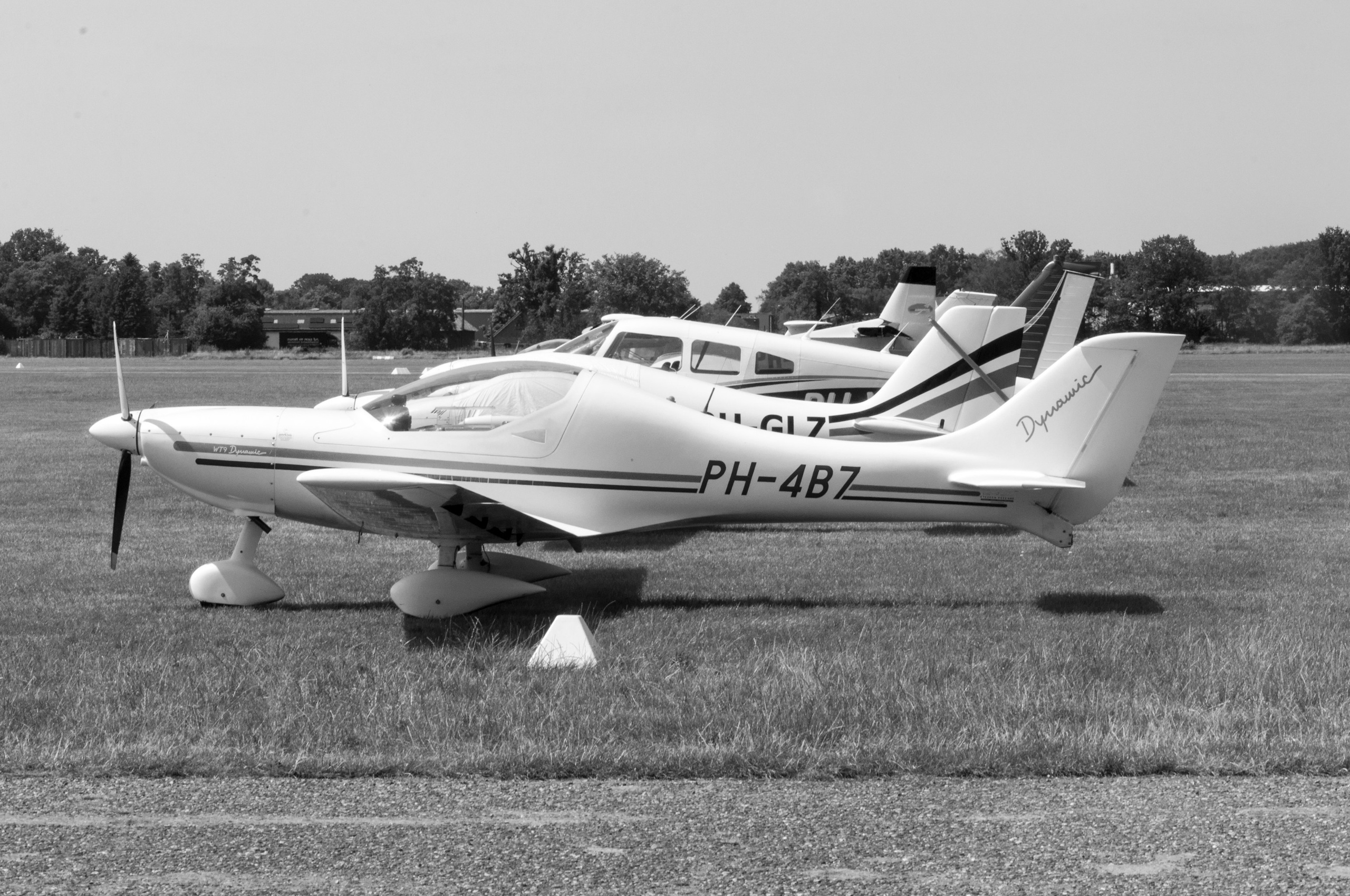 A photoshoot of a pilot and planes. Éclat Photos. Exclusive portrait photography service