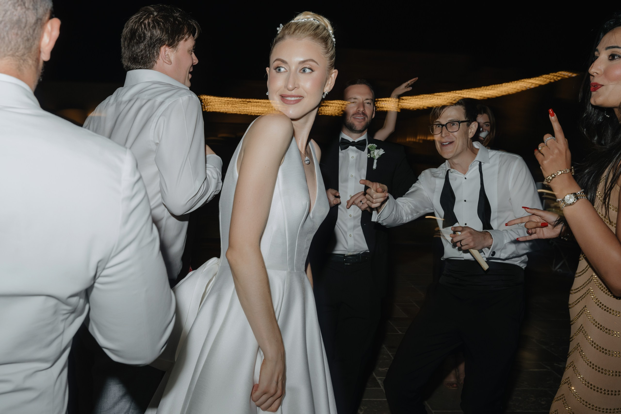 Romantic first dance under the lights at Masseria Traetta Exclusive wedding Ostuni