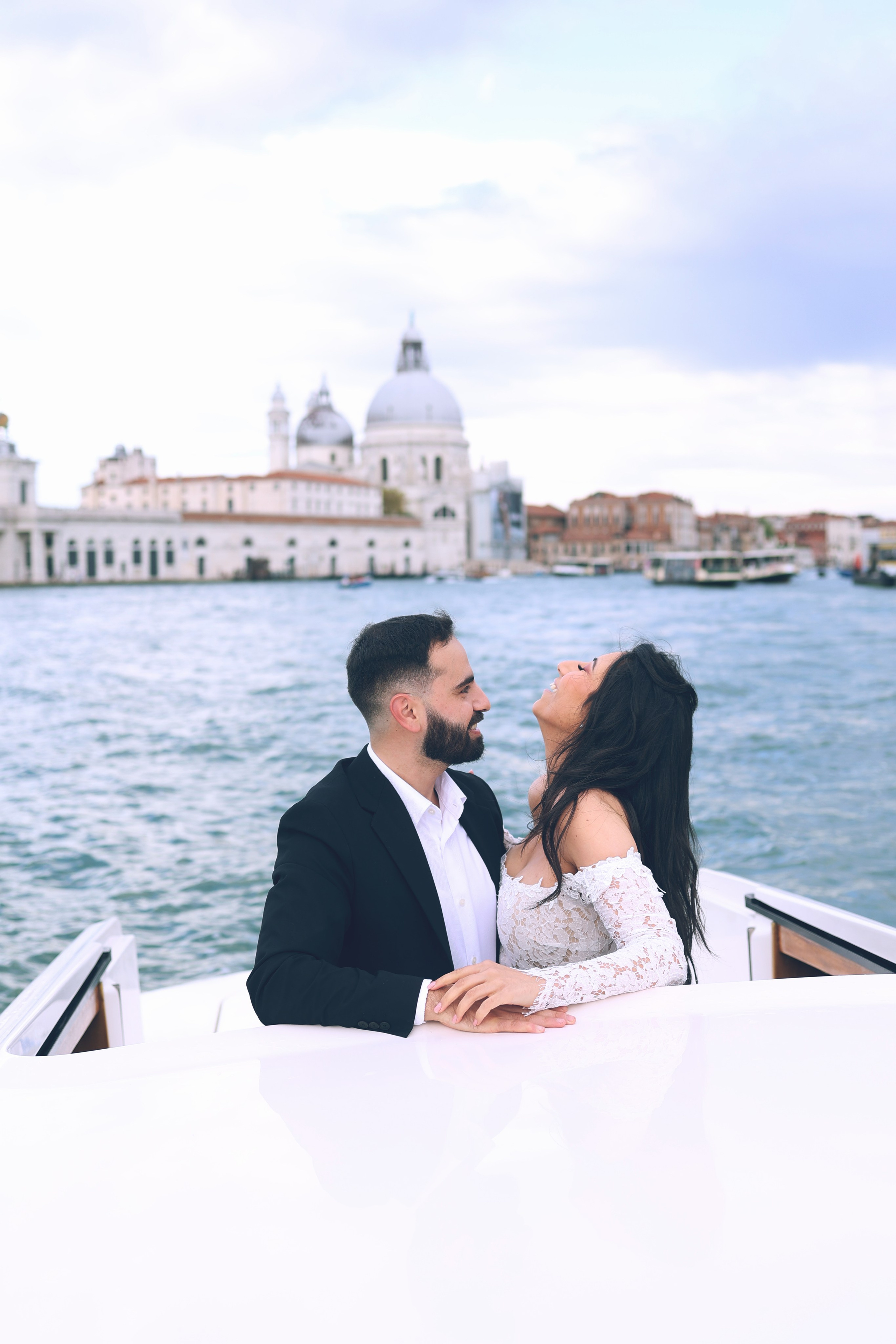Couple in a water taxi on the Grand Canal