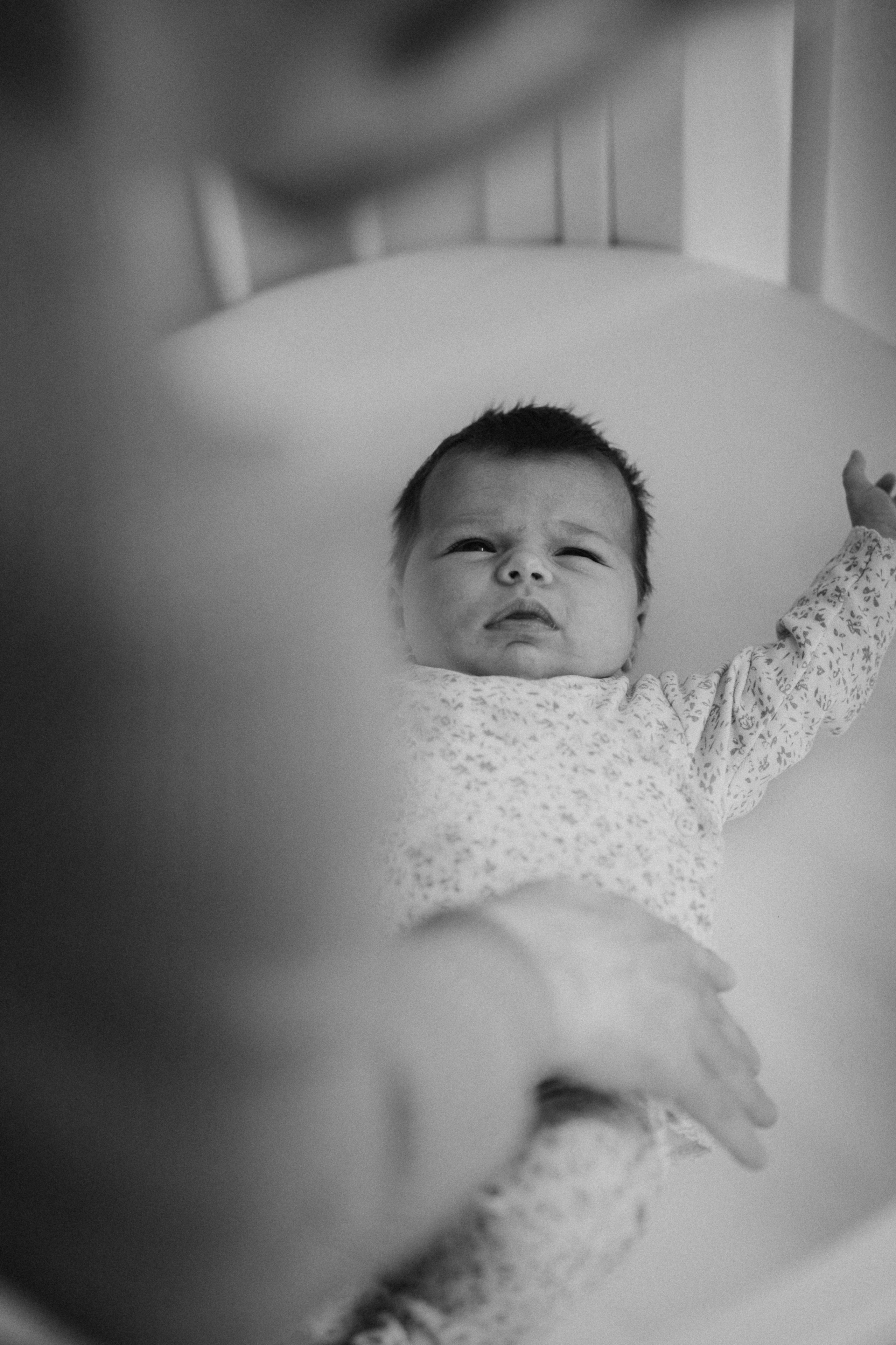 tiny baby in her cot