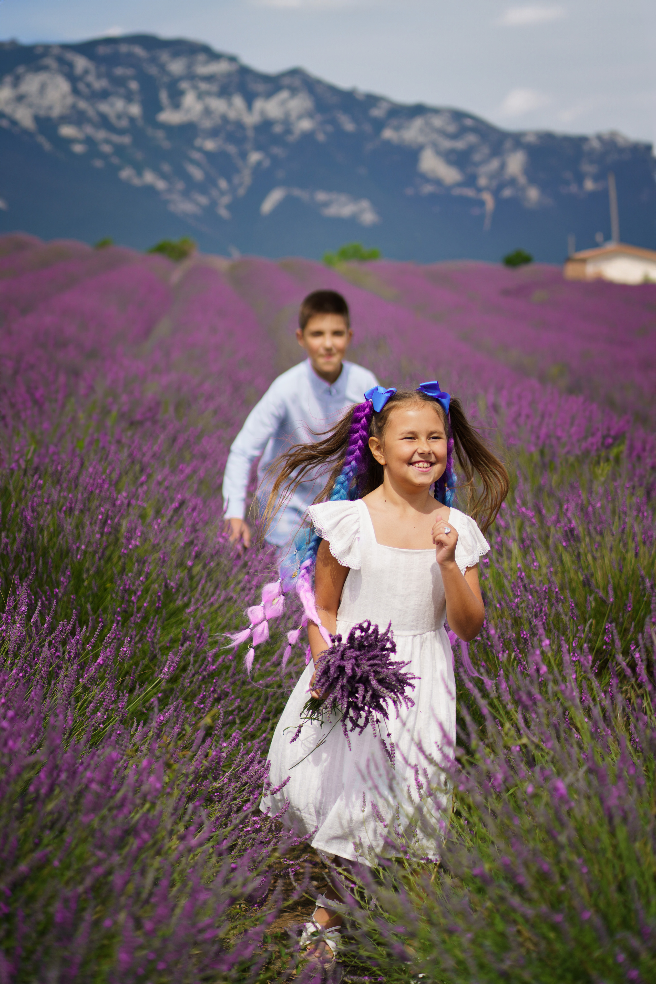 Cute kids in  the lavender field. Jelena Upleja children and family photographer in Bognor Regis