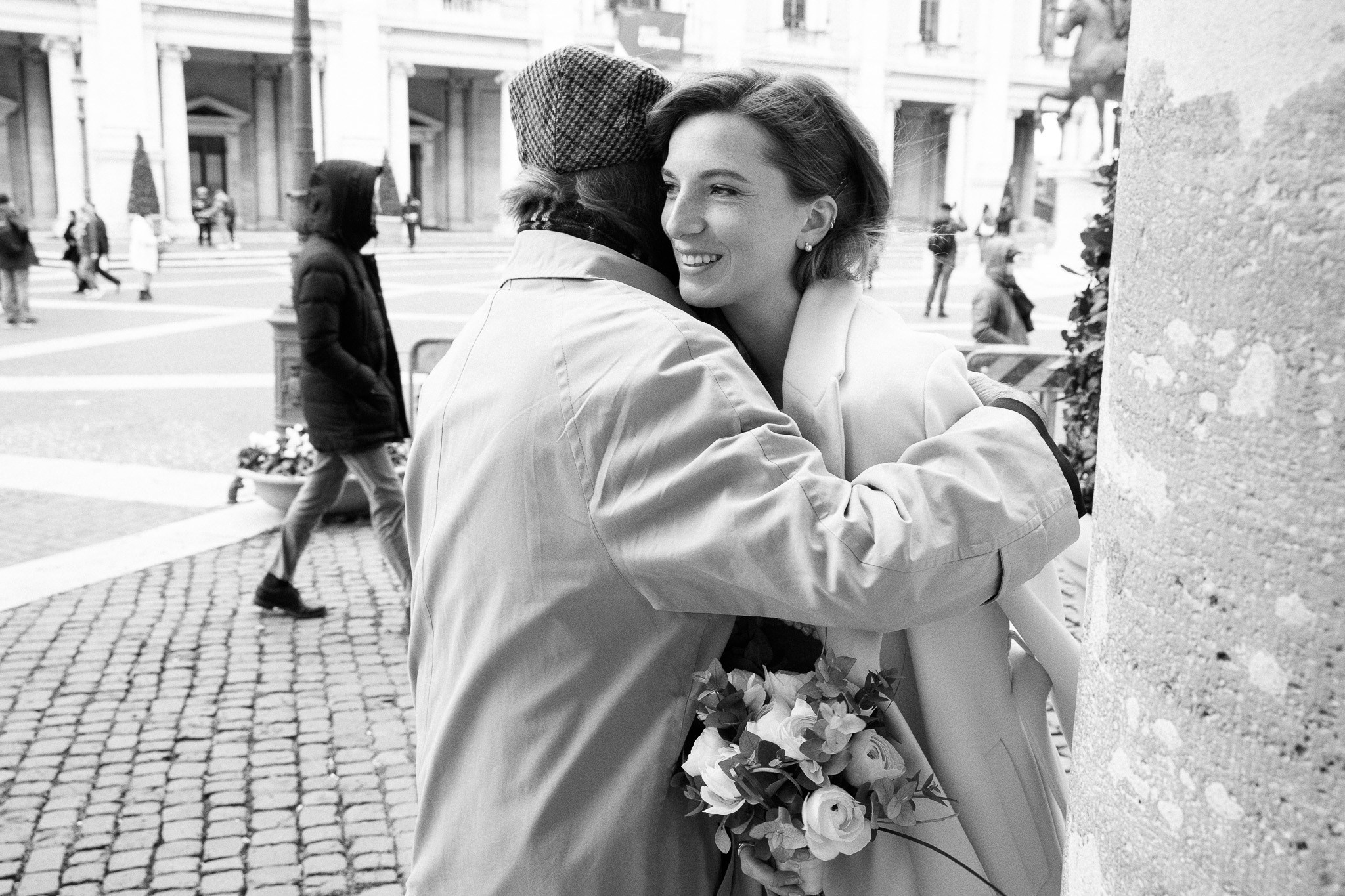 A bride hugging her father before the wedding.