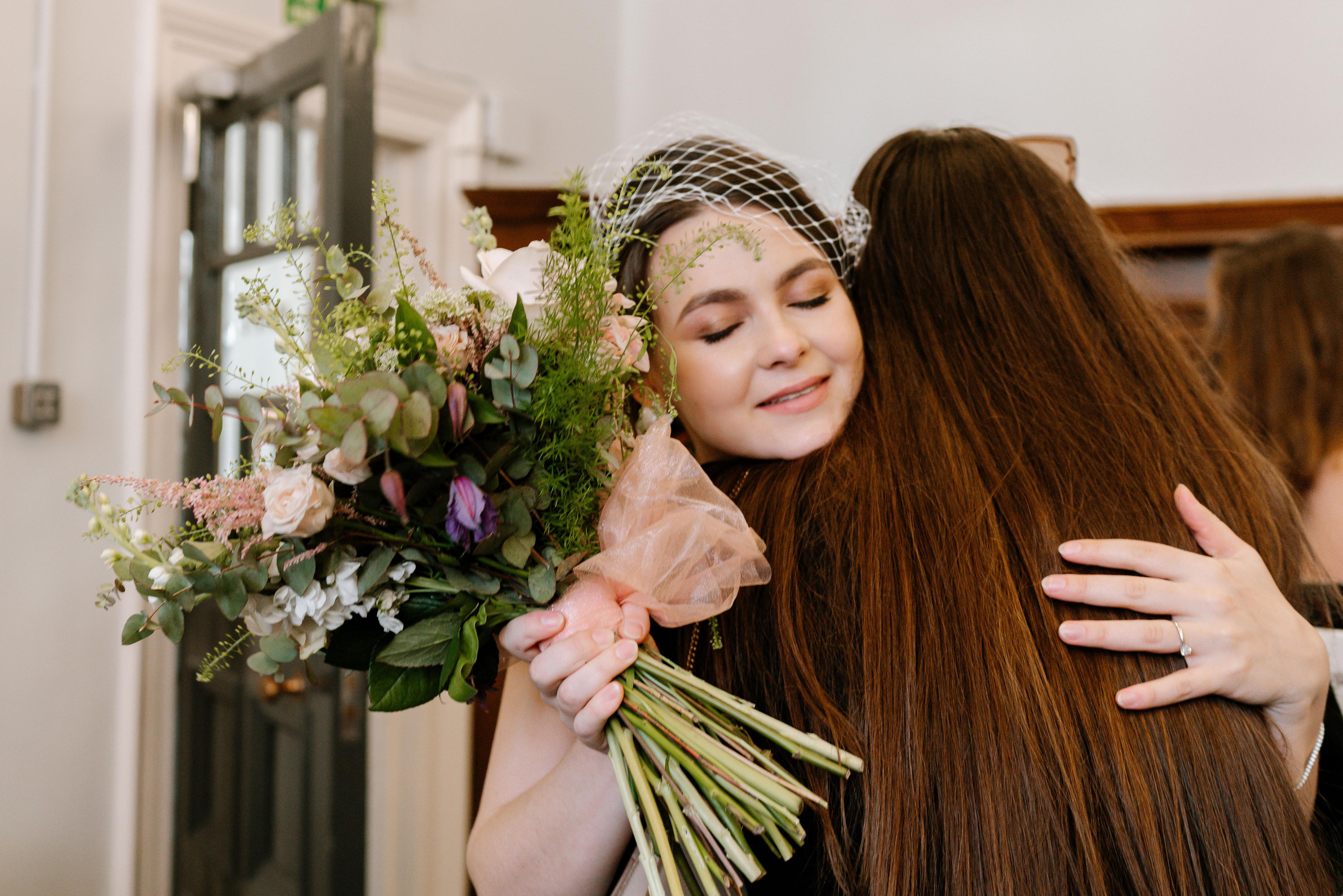Wedding ceremony in Mayfair Library. London Wedding Photographer|Natasha Ferreira