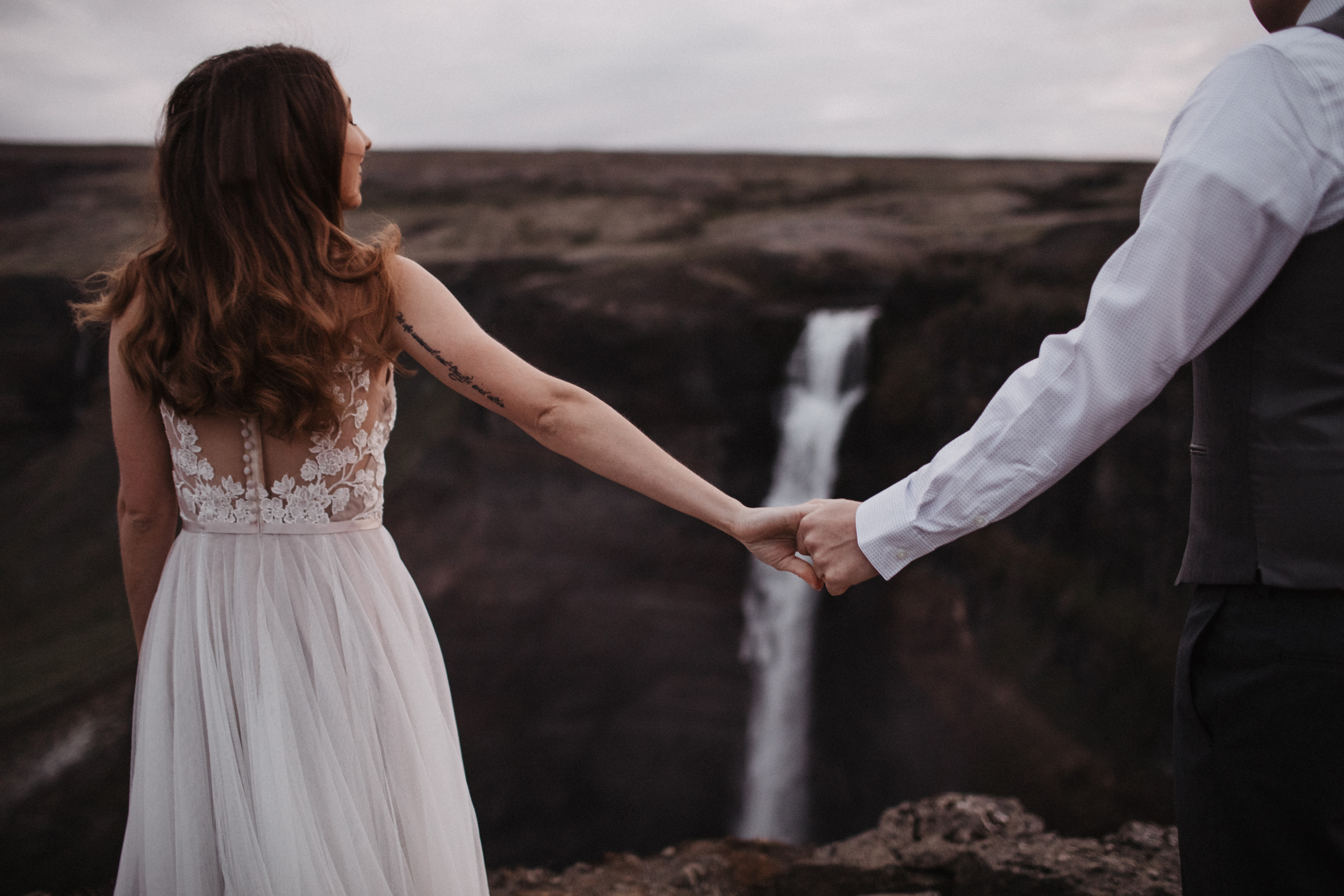 Midnight sun elopement at Haifoss in Iceland. Iceland elopement photo and video | Nikolaichik Photo