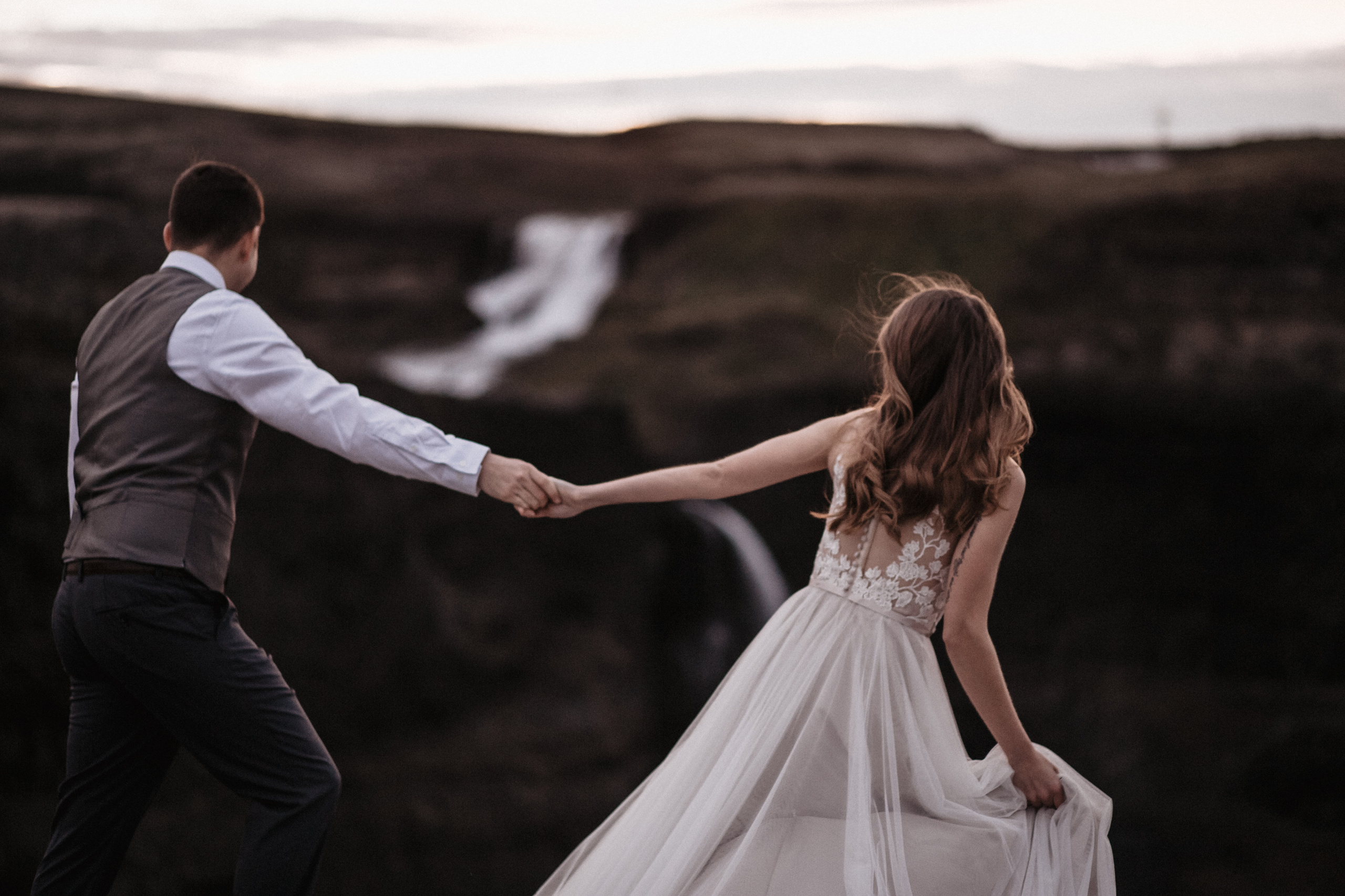 Midnight sun elopement at Haifoss in Iceland. Iceland elopement photo and video | Nikolaichik Photo