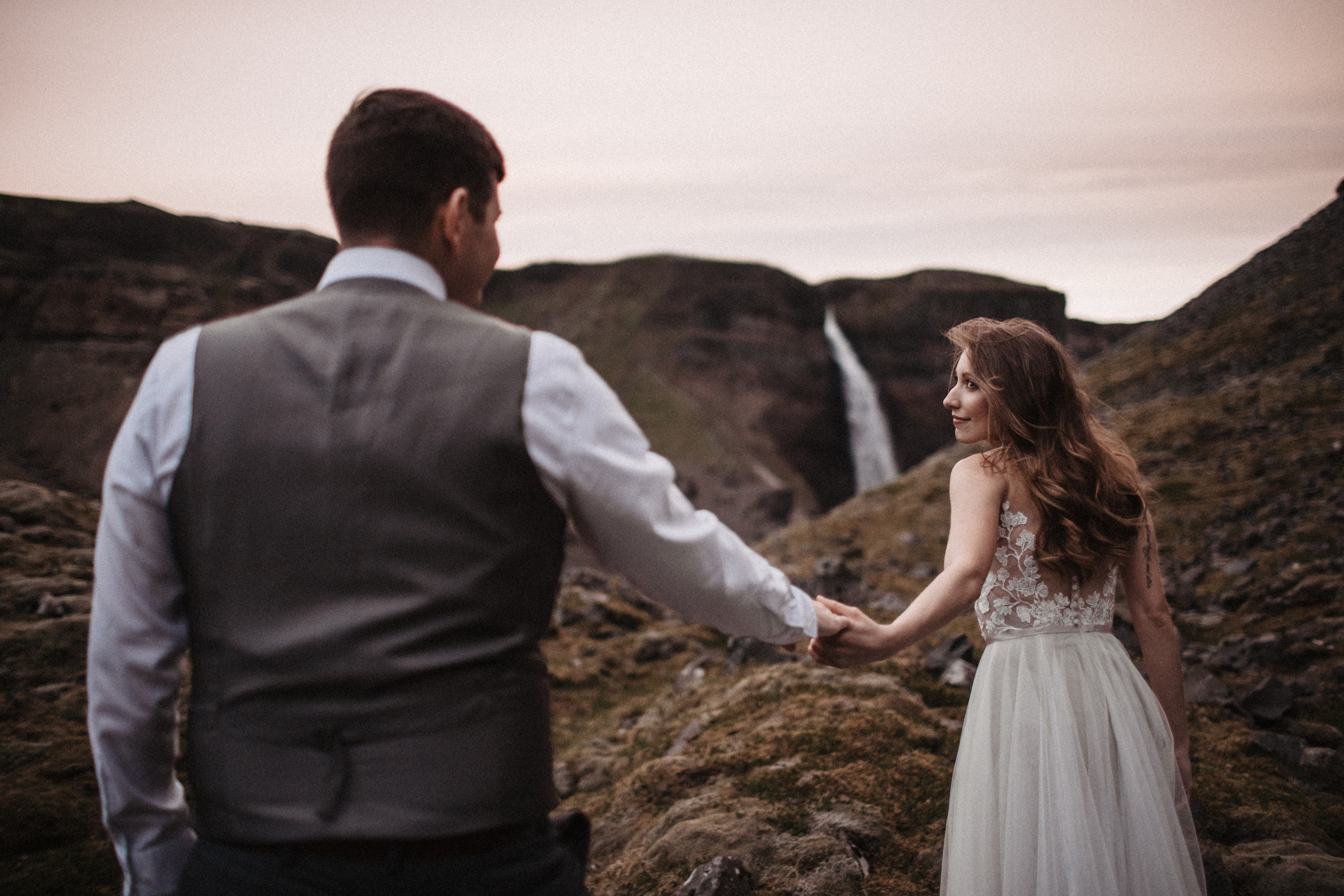 Midnight sun elopement at Haifoss in Iceland. Iceland elopement photo and video | Nikolaichik Photo