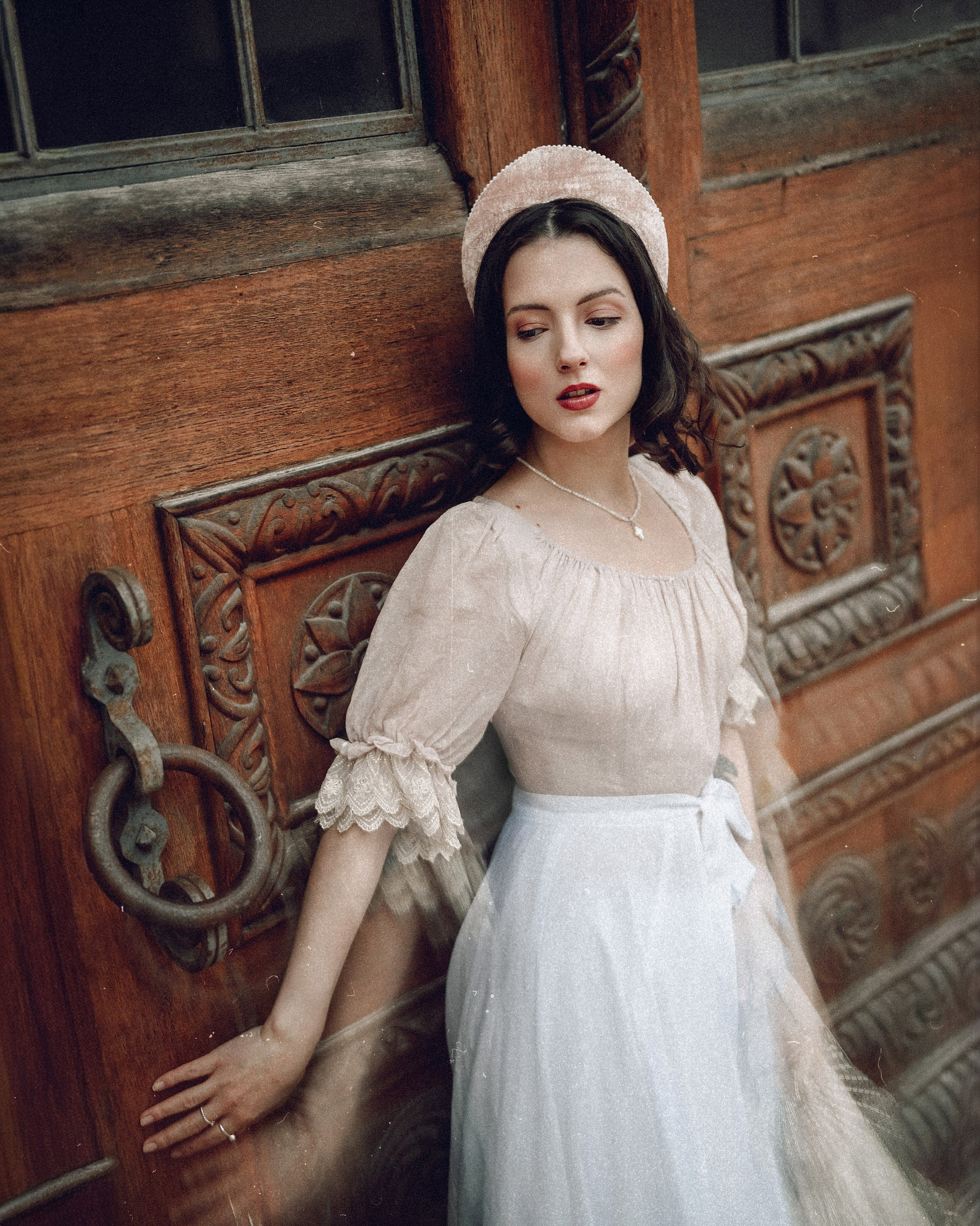 Slavic folklore shoot in traditional headwear and white dress. Moth & Moss Photography