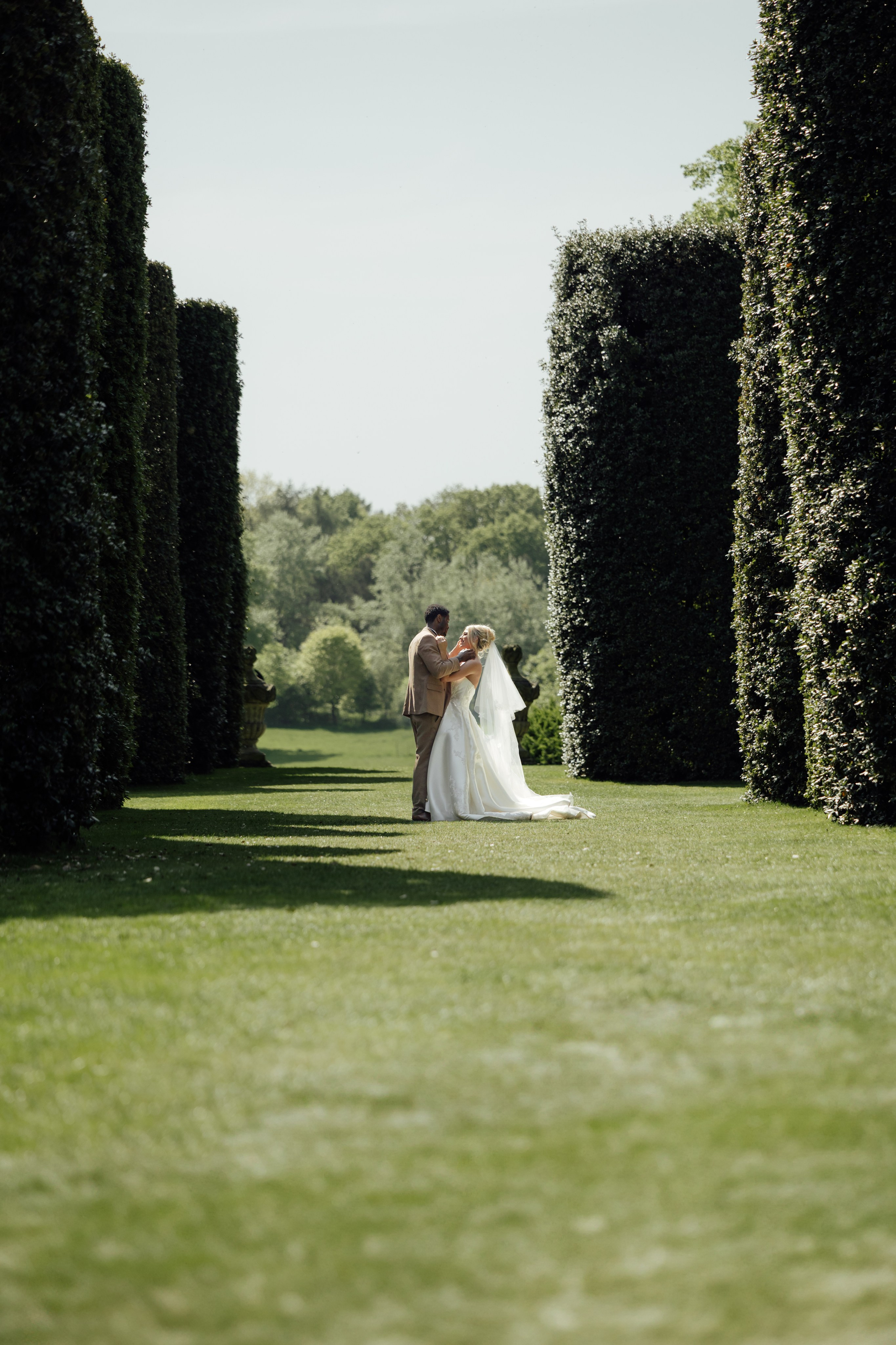 Elegant wedding portrait of bride and groom walking through the streets of ParisRomantic elopement moment captured in soft evening light in Paris, FranceLuxury wedding ceremony setup in a historic French venue with natural floralsCandid black and white photo of a couple at their city wedding in London, UKTimeless couple portrait in front of Marylebone Town Hall, LondonEditorial-style bridal preparation in a classic townhouse in the heart of LondonSoft light bridal portrait in a countryside château wedding in FranceFine art flat lay with French-inspired wedding details and vintage texturesCinematic golden hour photo at a UK estate wedding with historic architectureLuxury wedding tablescape with candles and florals at a London reception