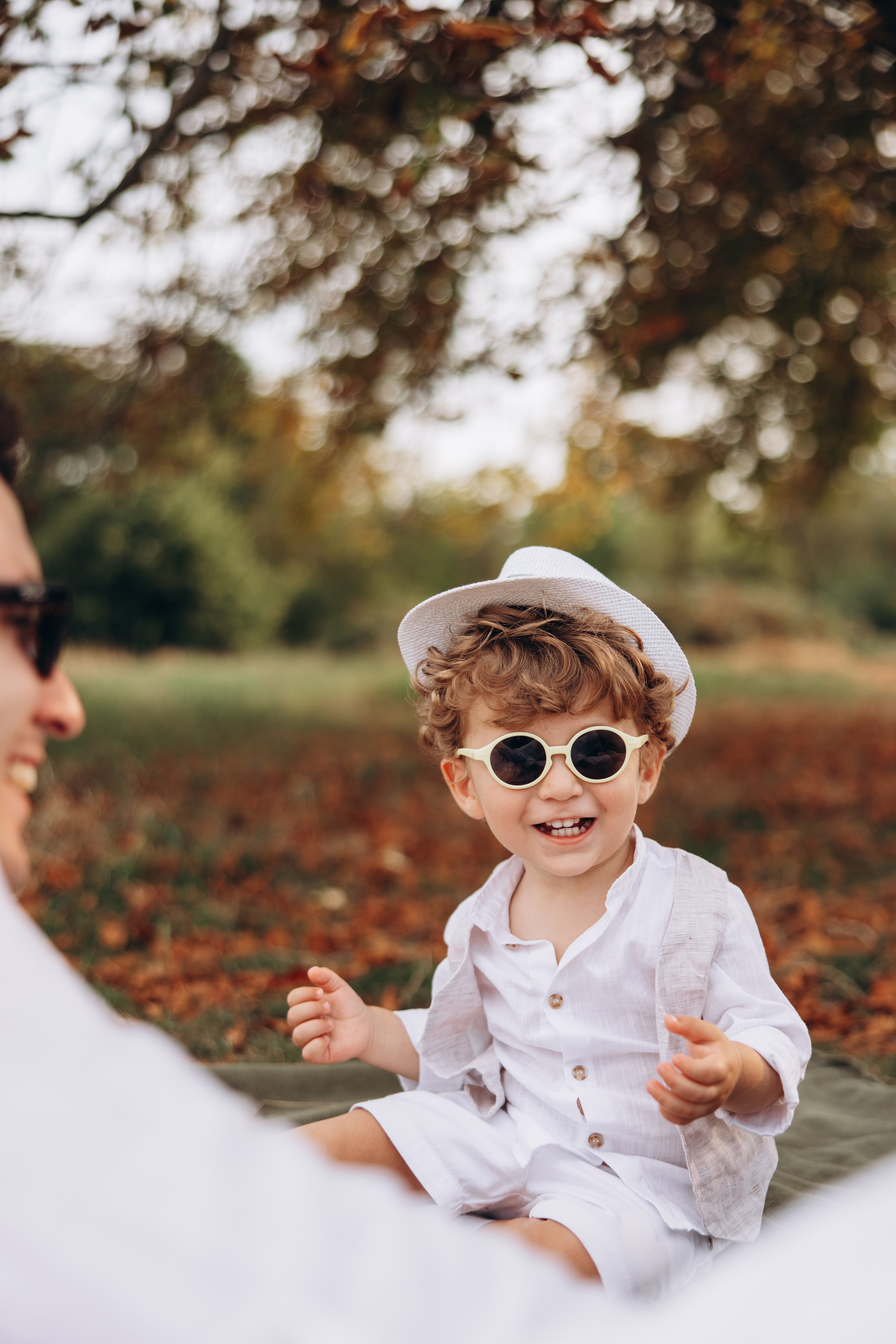Valerik with parents (Hyde park). Anastasia Klink, Photographer in London