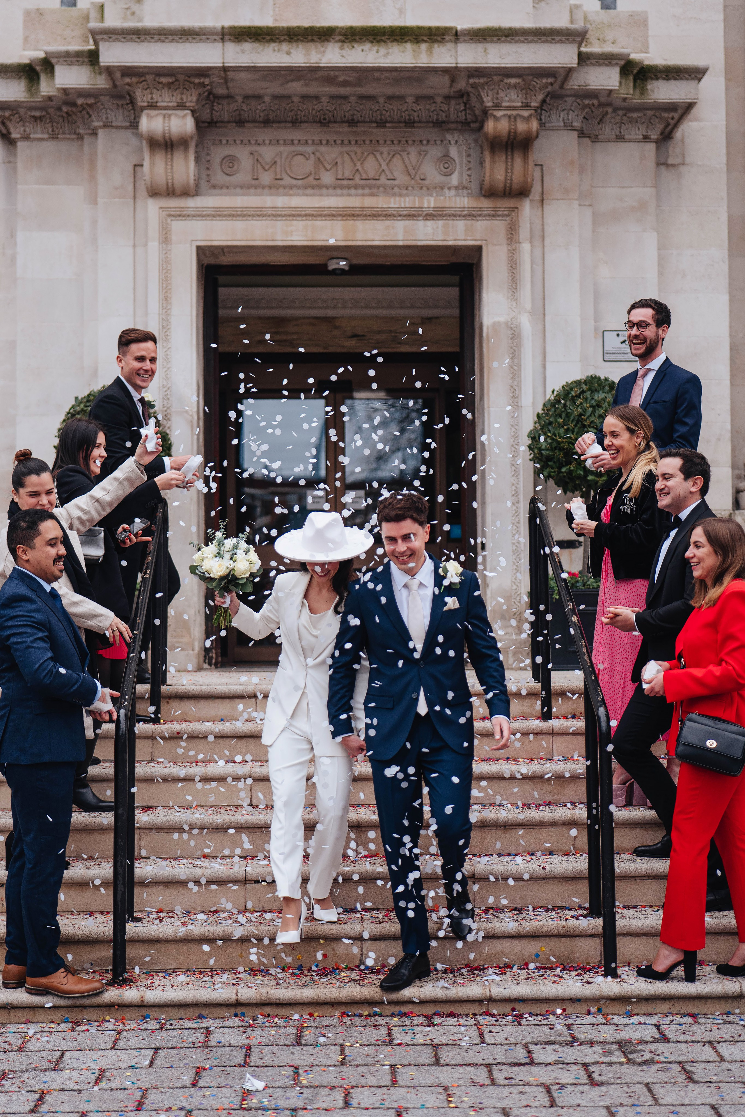 Exit from Islington town hall, meeting the couple with confetti