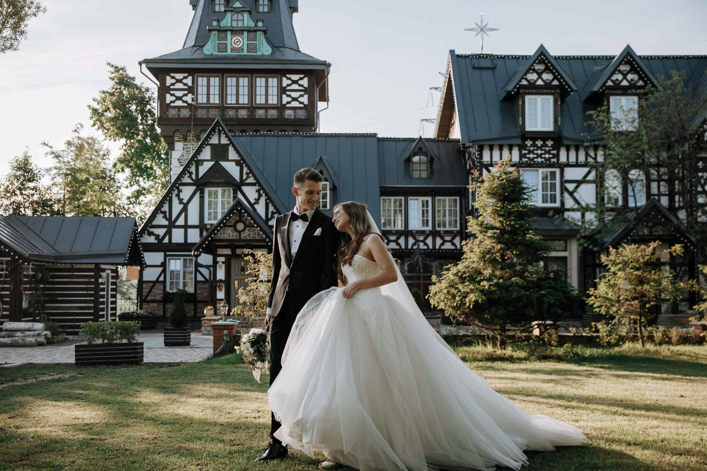 Couple’s romantic garden walk with grand house, by Tanya Bodgan, Truro wedding photography.