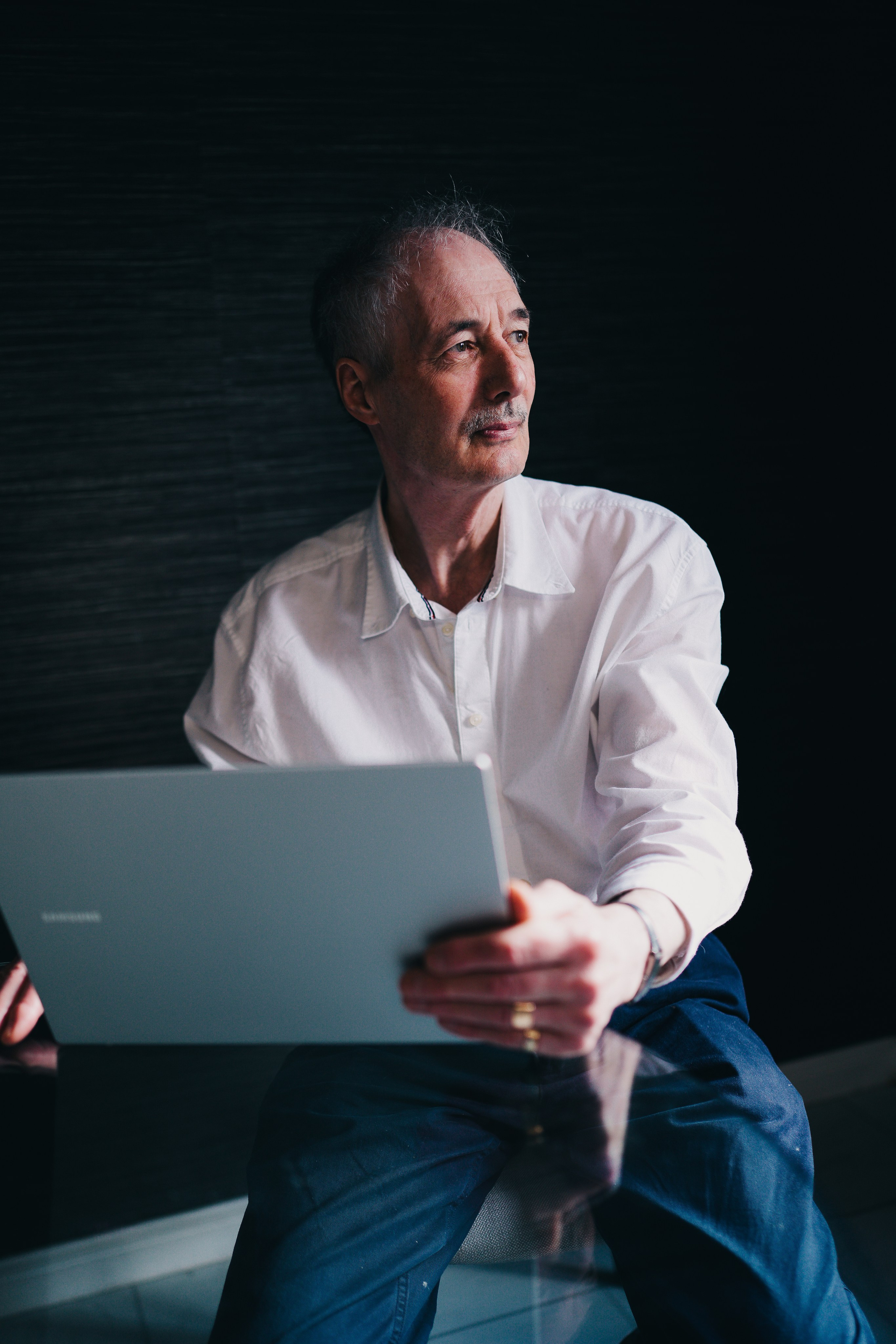Headshot at home in Solihull. Man with laptop. Corporative shot.