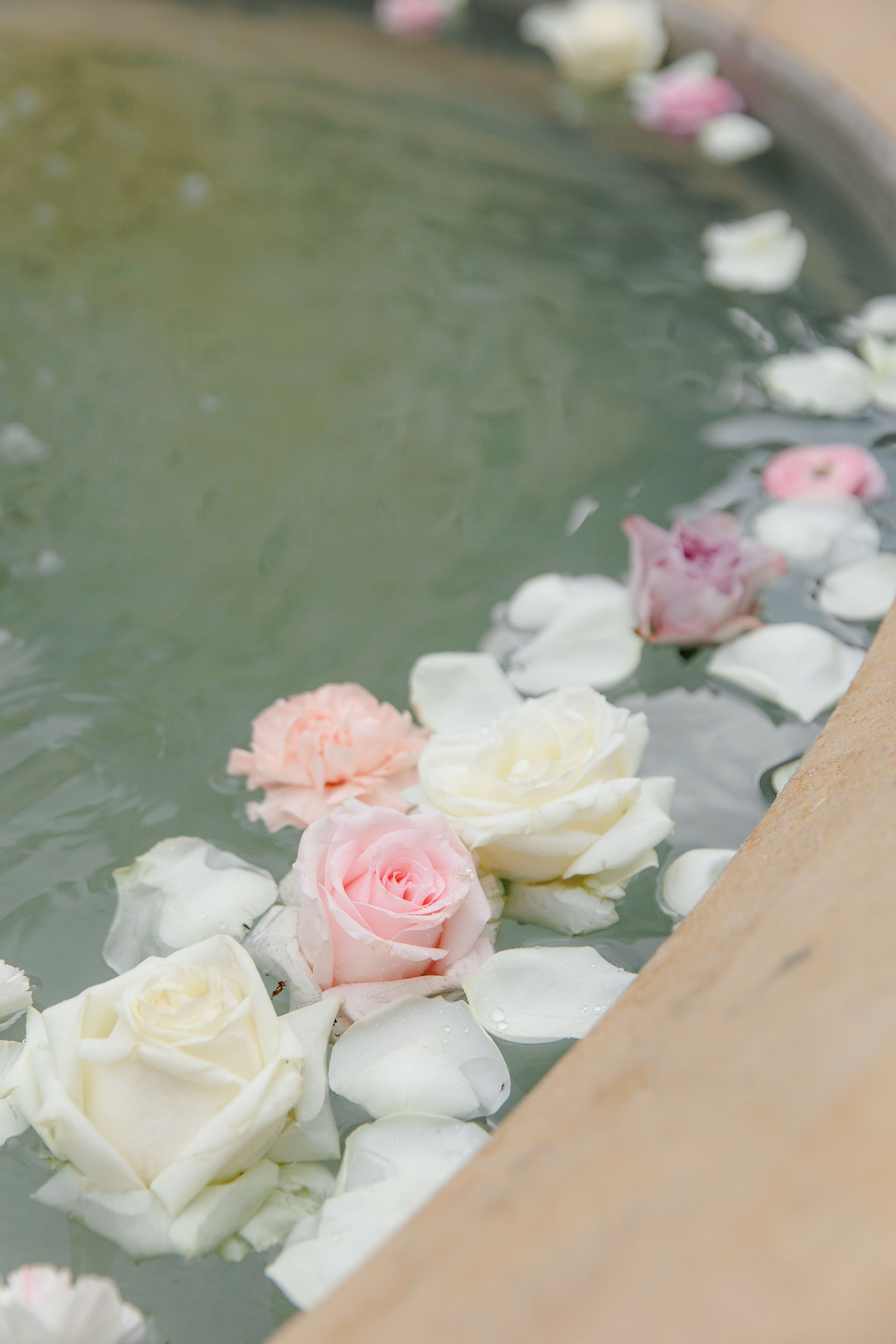 Beautiful ceremony decor featuring floral arrangements and elegant drapery, set up for a wedding in France.