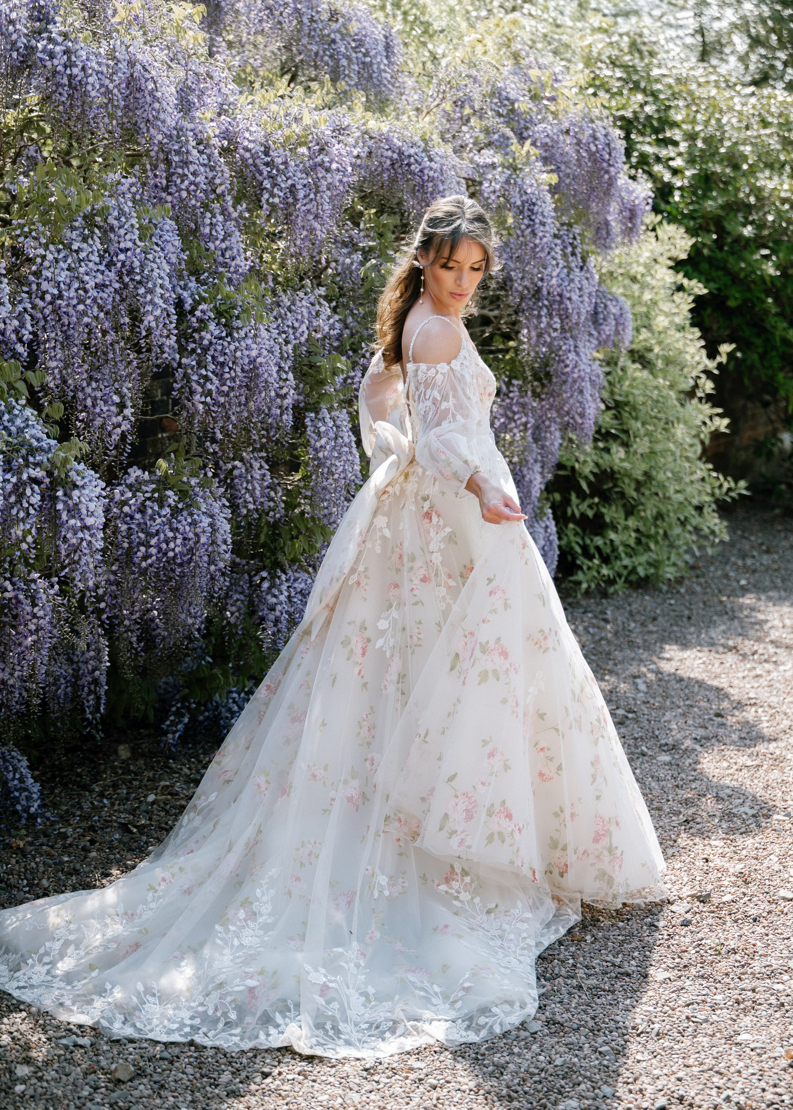 Elegant wedding portrait of bride and groom walking through the streets of ParisRomantic elopement moment captured in soft evening light in Paris, FranceLuxury wedding ceremony setup in a historic French venue with natural floralsCandid black and white photo of a couple at their city wedding in London, UKTimeless couple portrait in front of Marylebone Town Hall, LondonEditorial-style bridal preparation in a classic townhouse in the heart of LondonSoft light bridal portrait in a countryside château wedding in FranceFine art flat lay with French-inspired wedding details and vintage texturesCinematic golden hour photo at a UK estate wedding with historic architectureLuxury wedding tablescape with candles and florals at a London reception