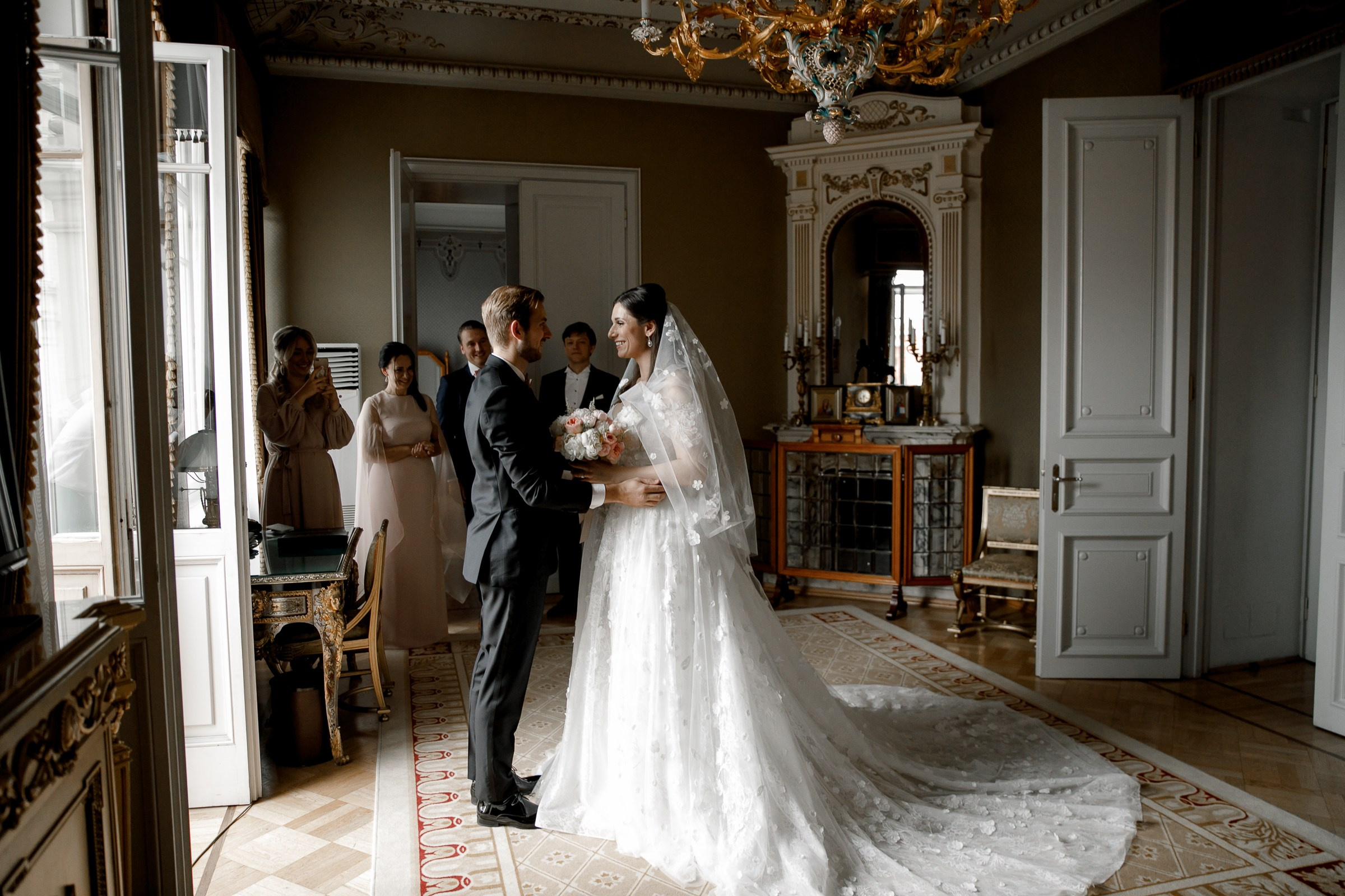 Couple’s morning portrait in grand room, by Bude, Cornwall wedding photographer.