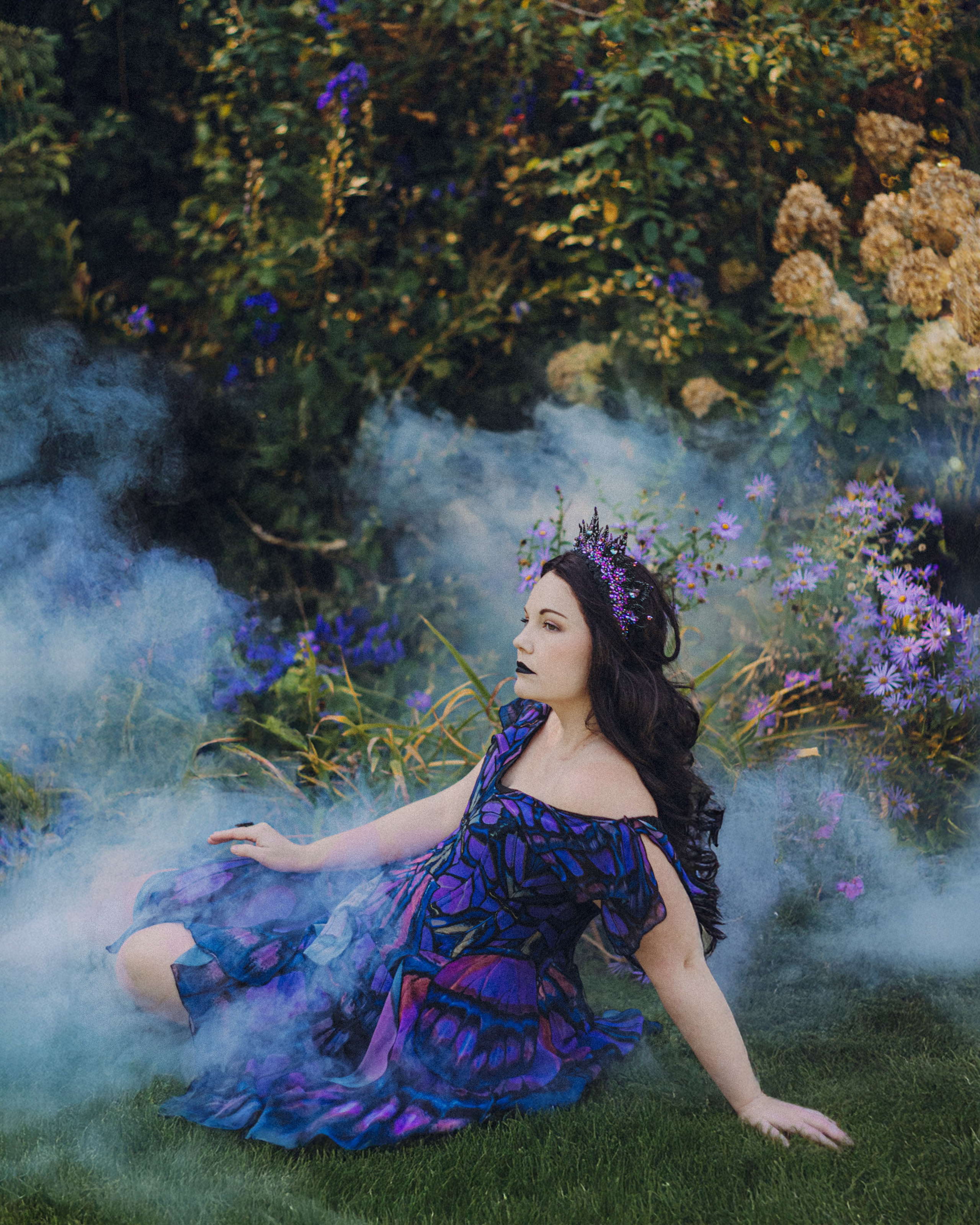 Butterfly purple fairy in a blooming garden. Moth & Moss Photography