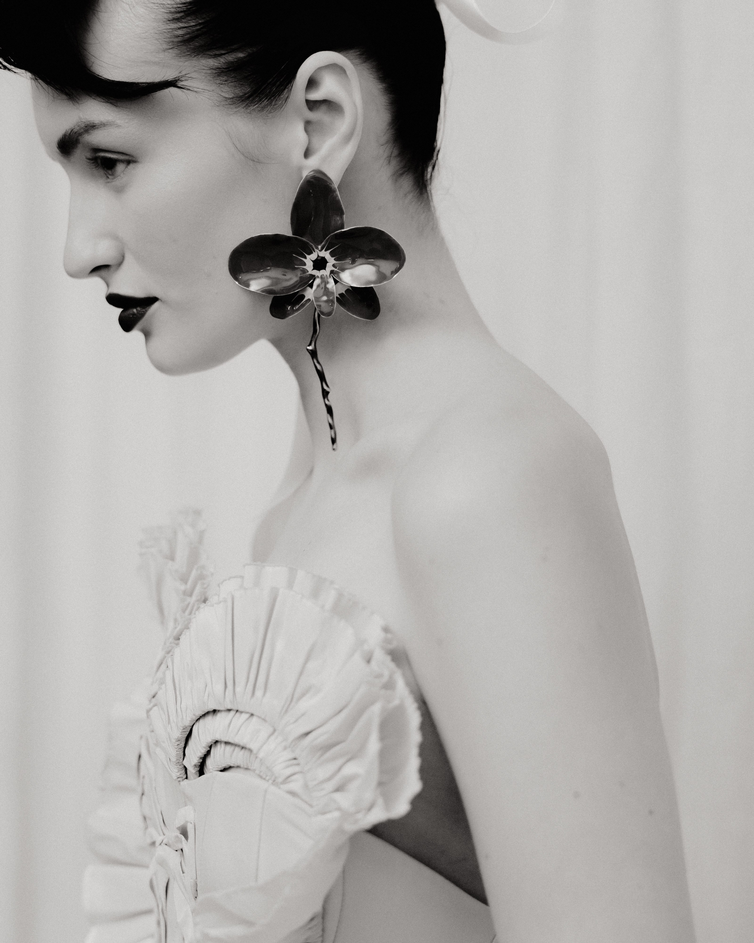 Contemporary female portrait with natural light in studio