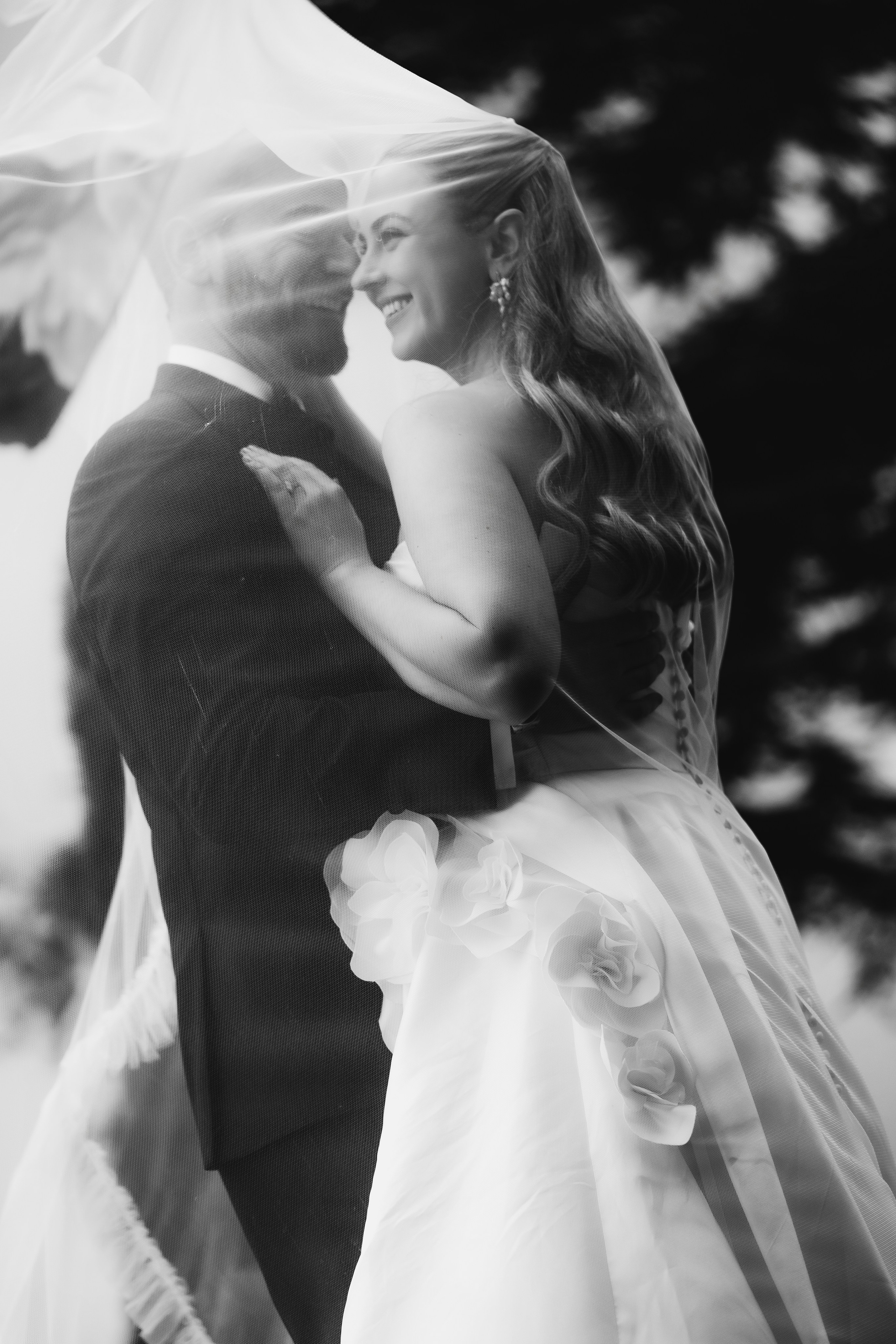 Elegant wedding portrait of bride and groom walking through the streets of ParisRomantic elopement moment captured in soft evening light in Paris, FranceLuxury wedding ceremony setup in a historic French venue with natural floralsCandid black and white photo of a couple at their city wedding in London, UKTimeless couple portrait in front of Marylebone Town Hall, LondonEditorial-style bridal preparation in a classic townhouse in the heart of LondonSoft light bridal portrait in a countryside château wedding in FranceFine art flat lay with French-inspired wedding details and vintage texturesCinematic golden hour photo at a UK estate wedding with historic architectureLuxury wedding tablescape with candles and florals at a London reception