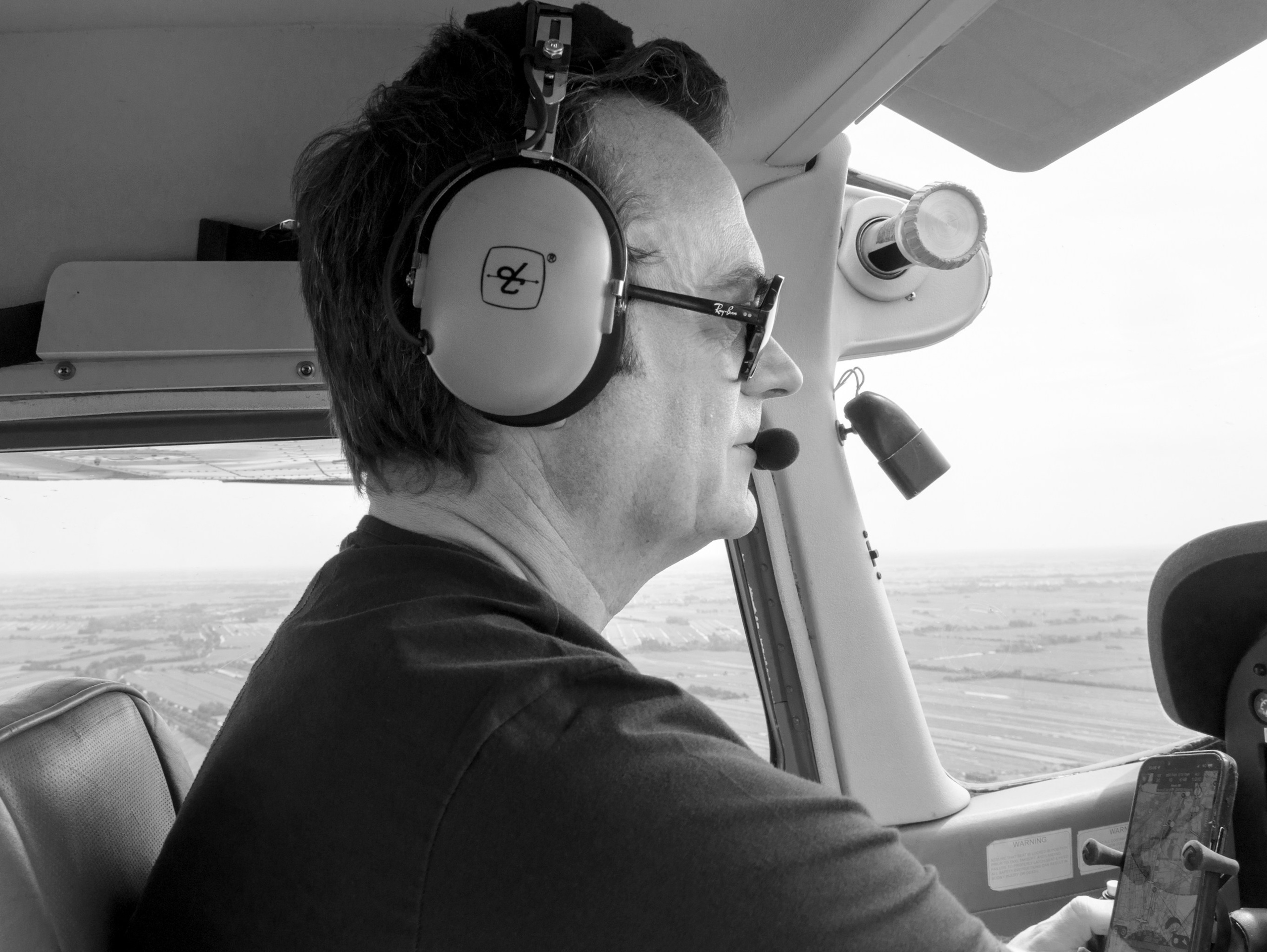 A photoshoot of a pilot and planes. Éclat Photos. Exclusive portrait photography service