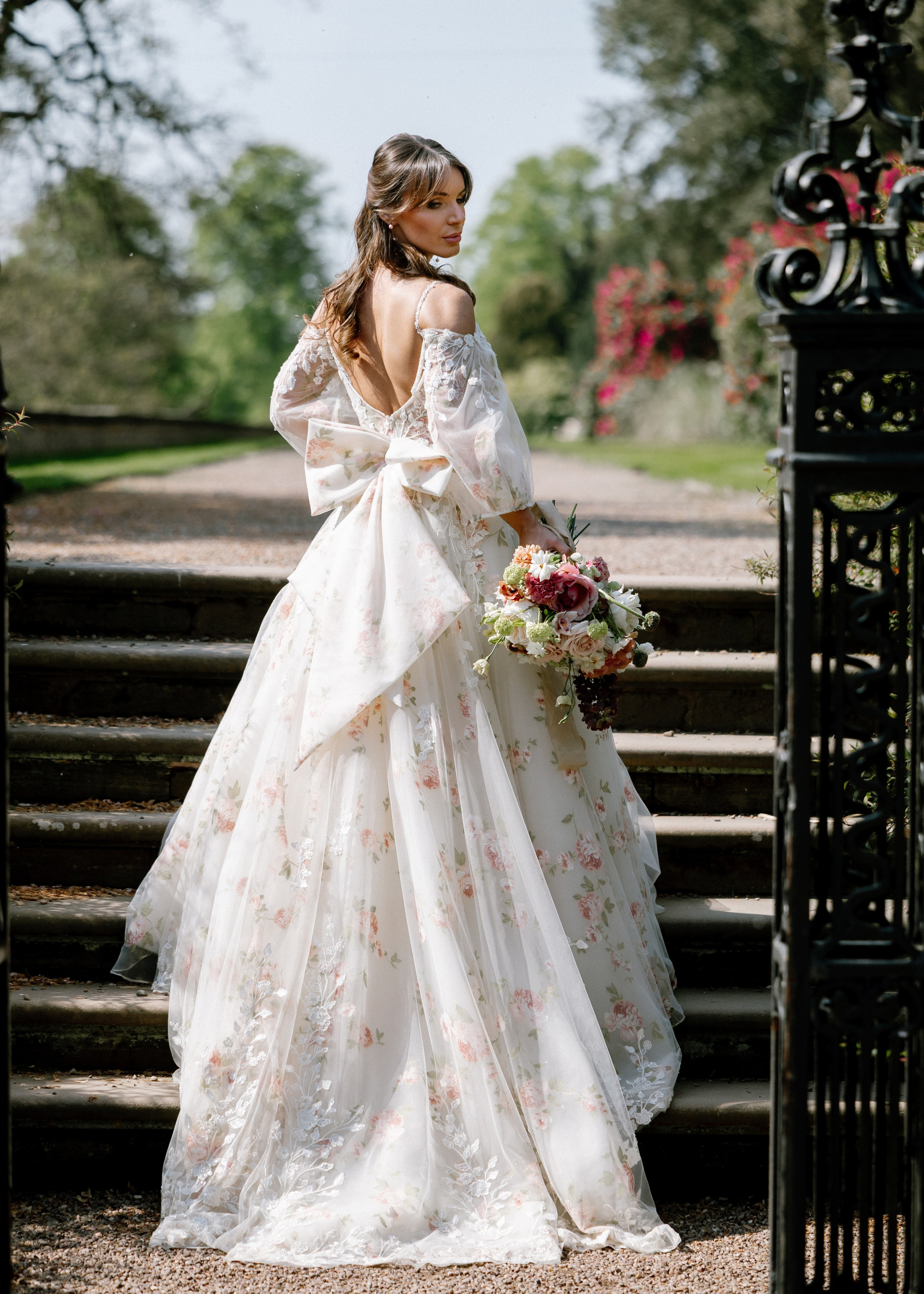 Elegant wedding portrait of bride and groom walking through the streets of ParisRomantic elopement moment captured in soft evening light in Paris, FranceLuxury wedding ceremony setup in a historic French venue with natural floralsCandid black and white photo of a couple at their city wedding in London, UKTimeless couple portrait in front of Marylebone Town Hall, LondonEditorial-style bridal preparation in a classic townhouse in the heart of LondonSoft light bridal portrait in a countryside château wedding in FranceFine art flat lay with French-inspired wedding details and vintage texturesCinematic golden hour photo at a UK estate wedding with historic architectureLuxury wedding tablescape with candles and florals at a London reception