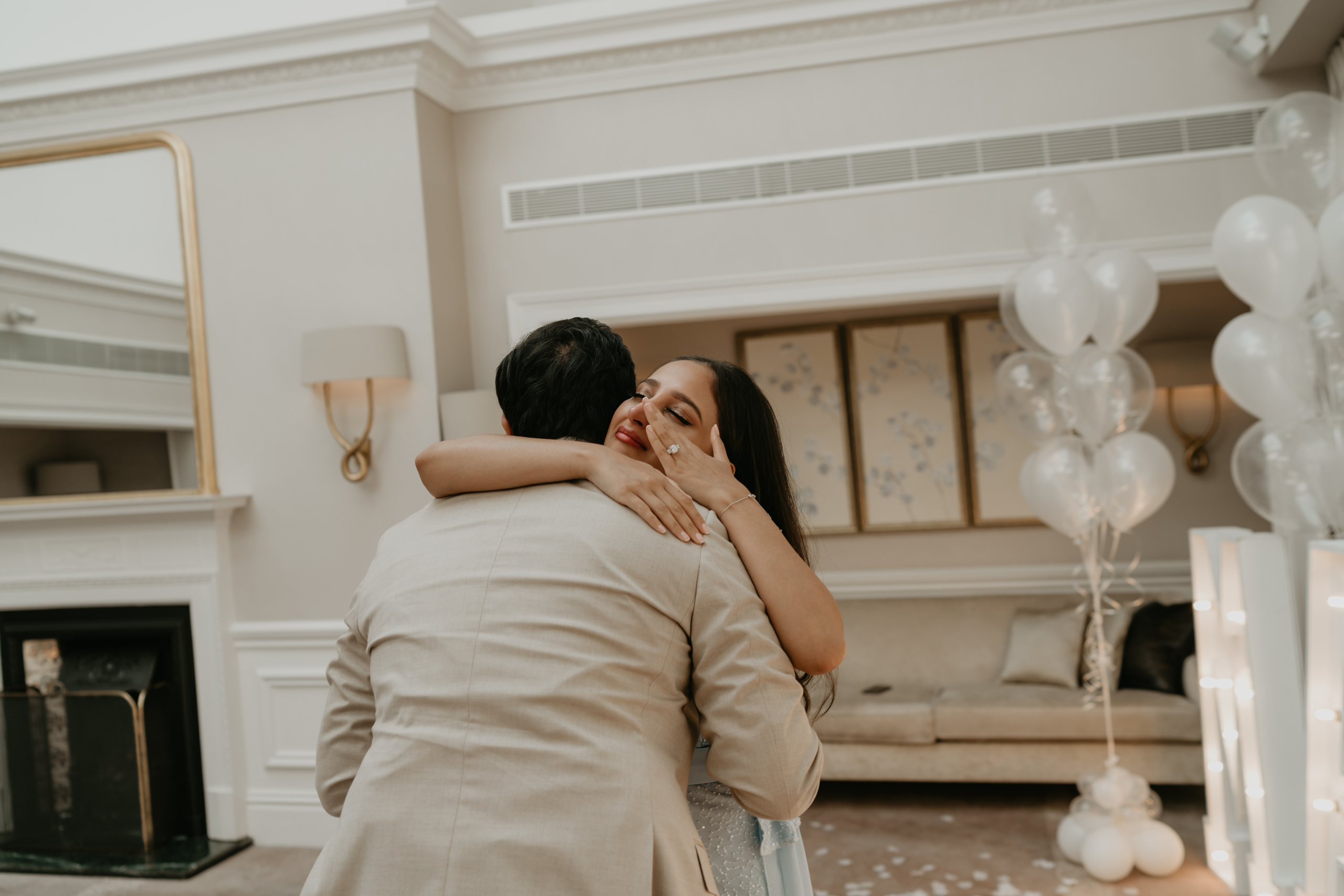 young women is crying after surprised wedding proposal 