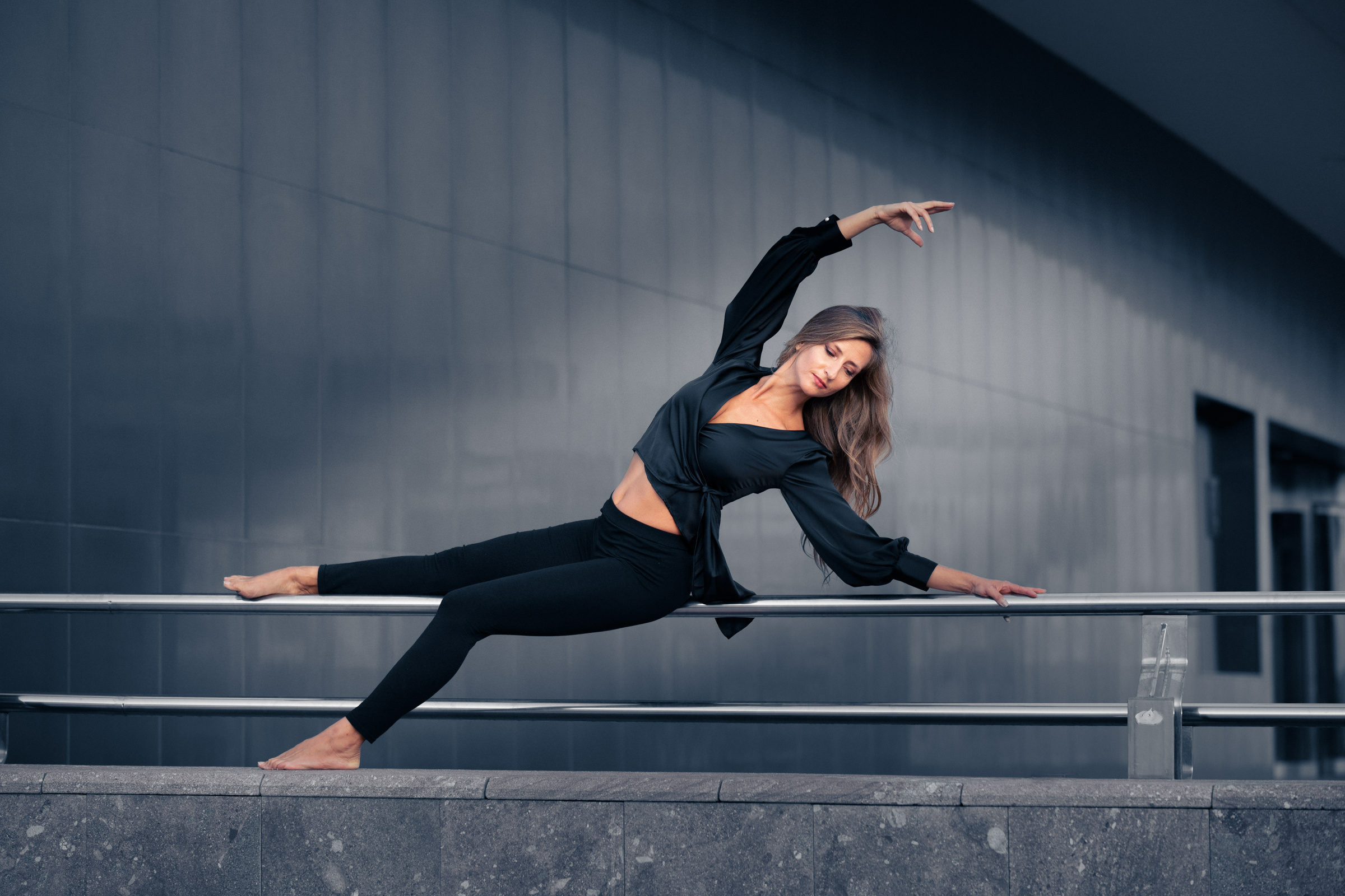 Portrait photo shoot  little girl petting a white horse.