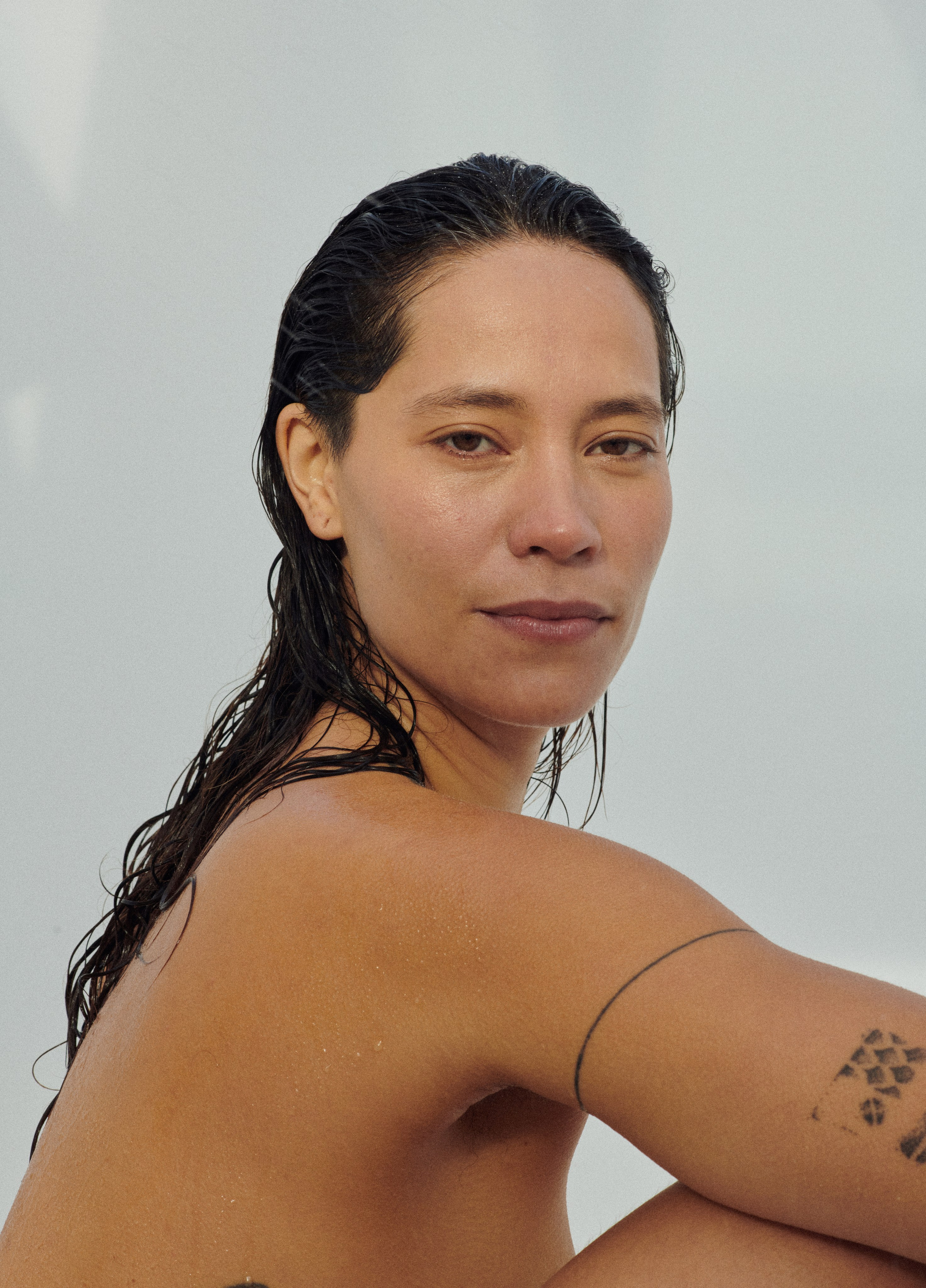 Portrait photoshoot with a rain, a woman photographer in Amsterdam 