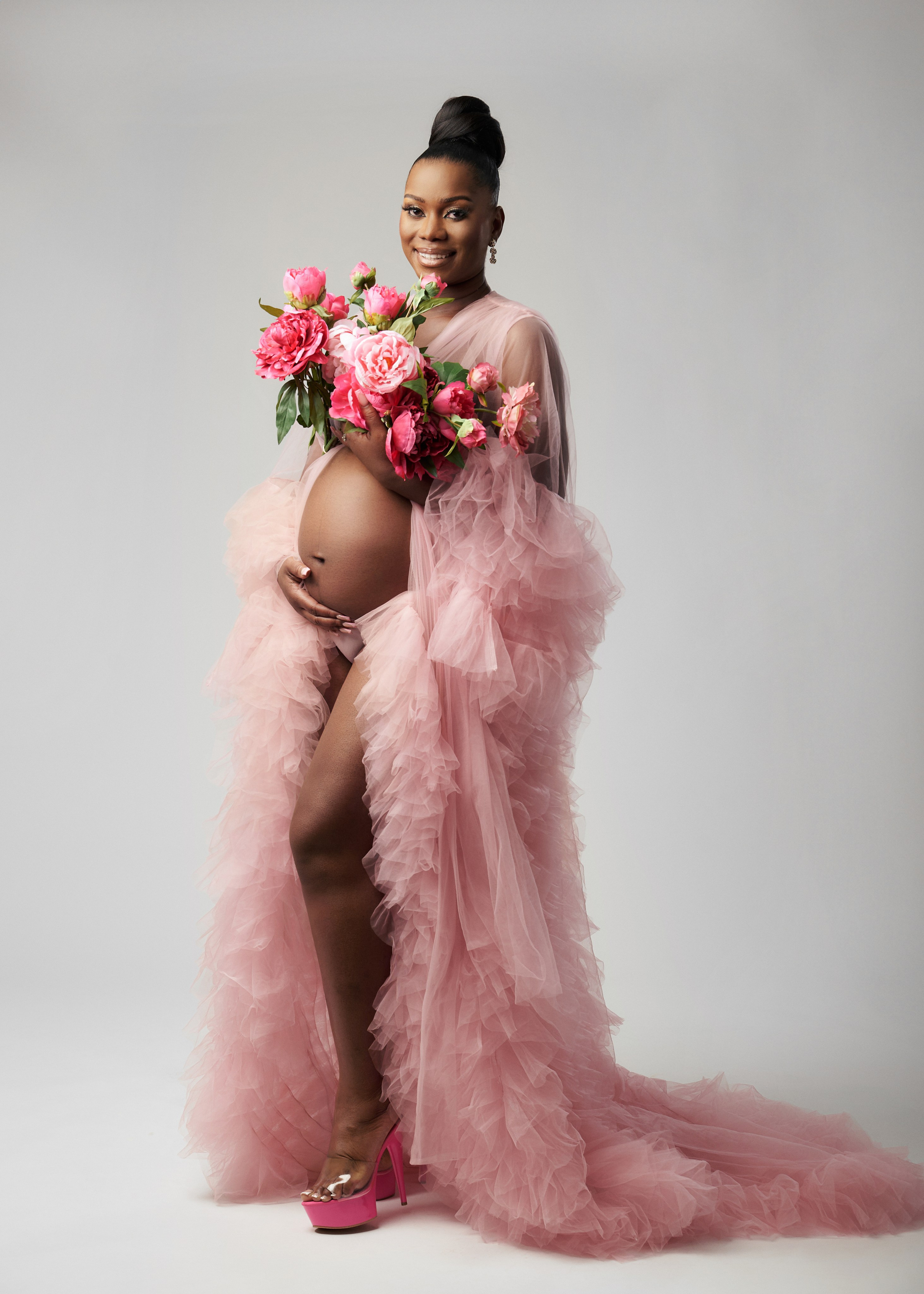 Pregnancy. Triple-A photo studio