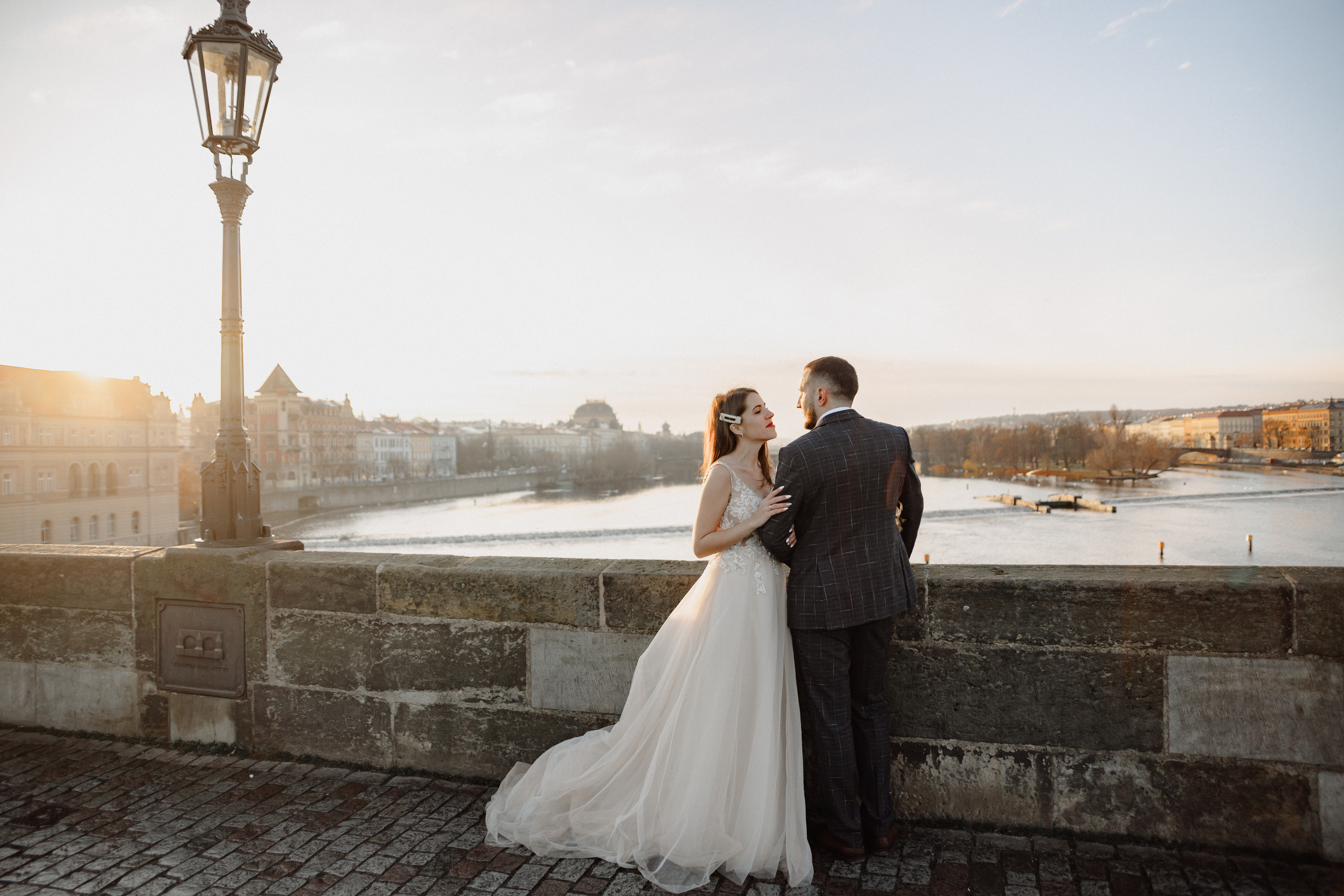 Christmas elopement of a couple in Prague. Wedding and portrait photographer in Poland Vitali Frozen