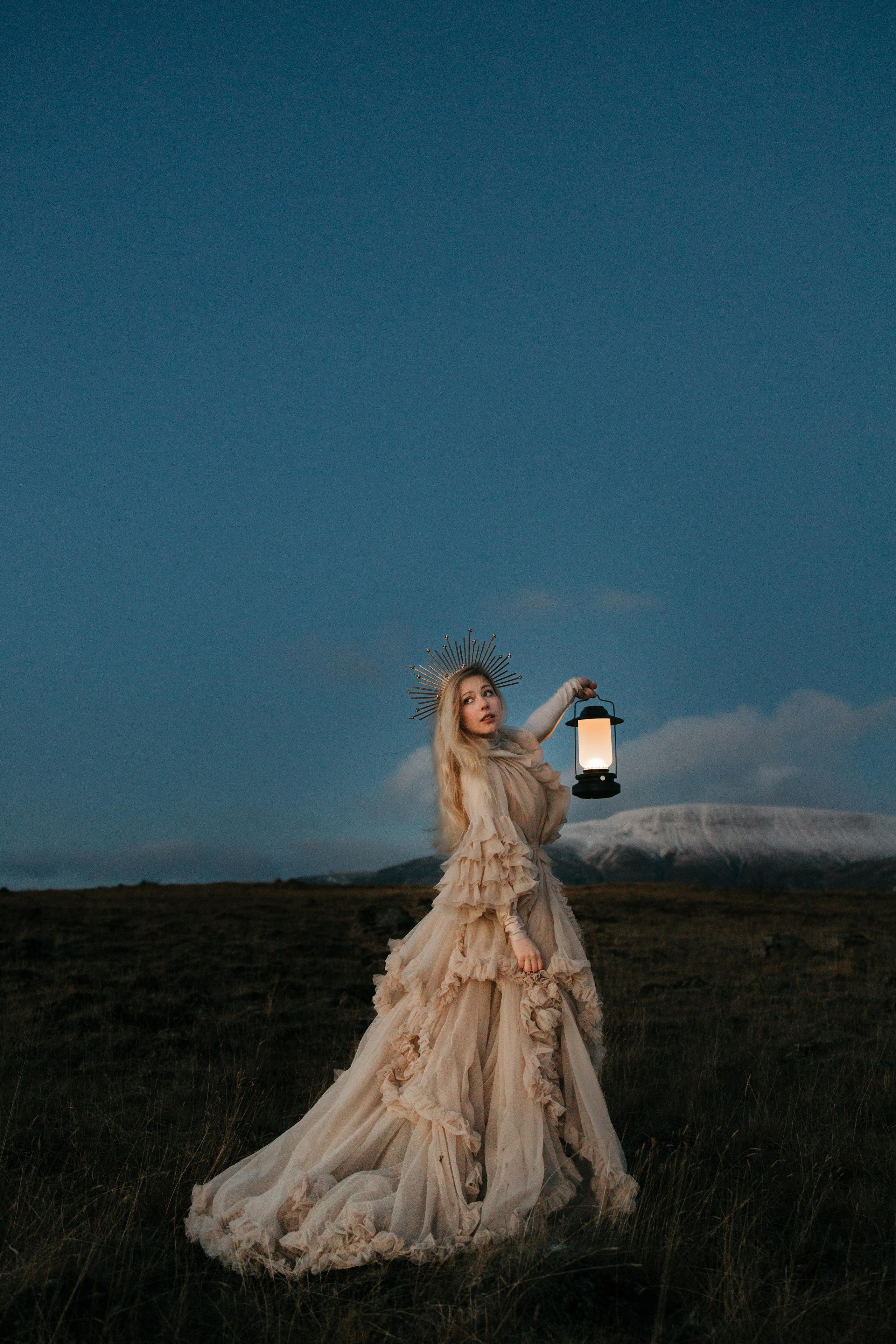 Ethereal feminine portrait in Iceland’s breathtaking landscape, blending strength and grace.