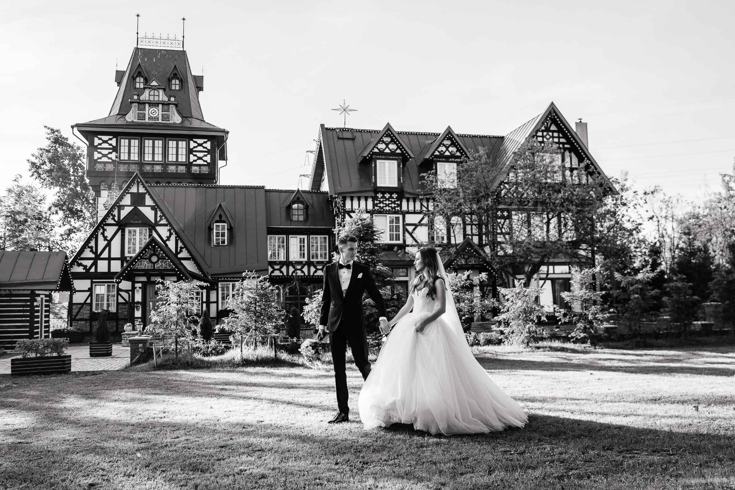 Couple’s garden stroll with grand house, by Tanya Bodgan, Bude, Cornwall wedding photography.