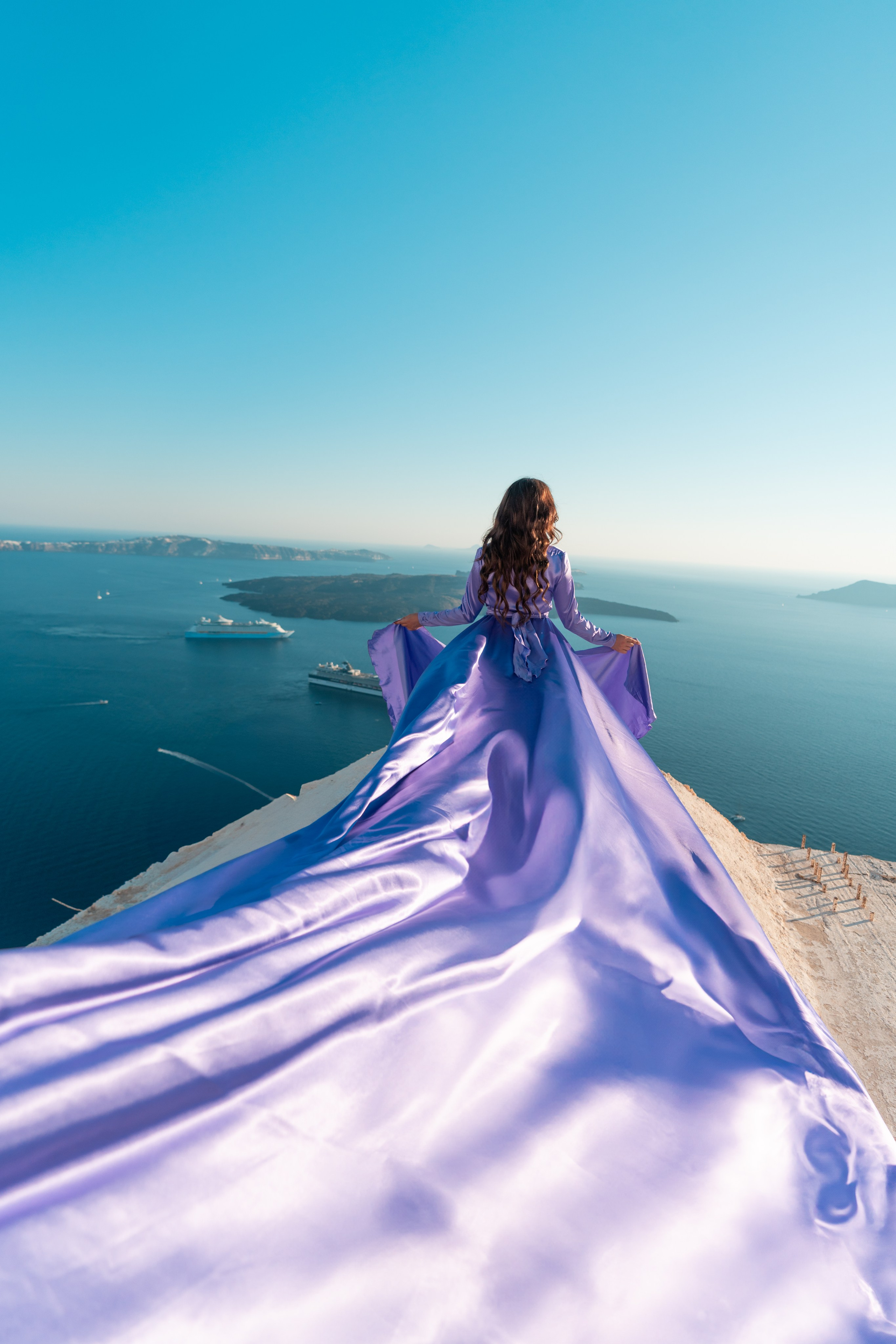 Séance photo d'une heure en robe volante. Photographe vidéaste à Santorin|Séances photos de Robe volante Santorin|