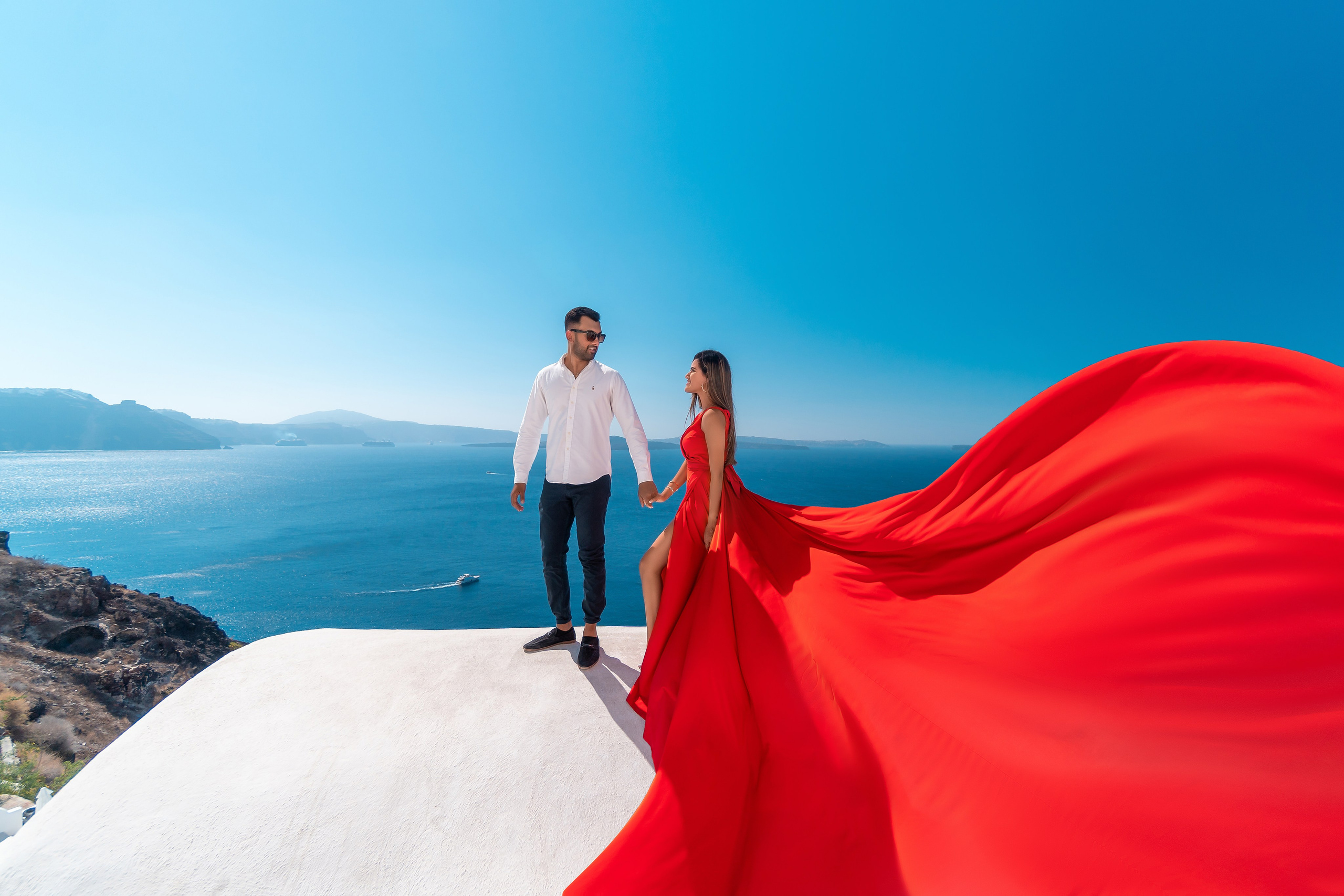 Santorini’s Magic in Motion: Flying Dress Photoshoot with a Lovely Couple from India. Photographer in Santorini SokoLOVE Alex| Flying Dress Santorini