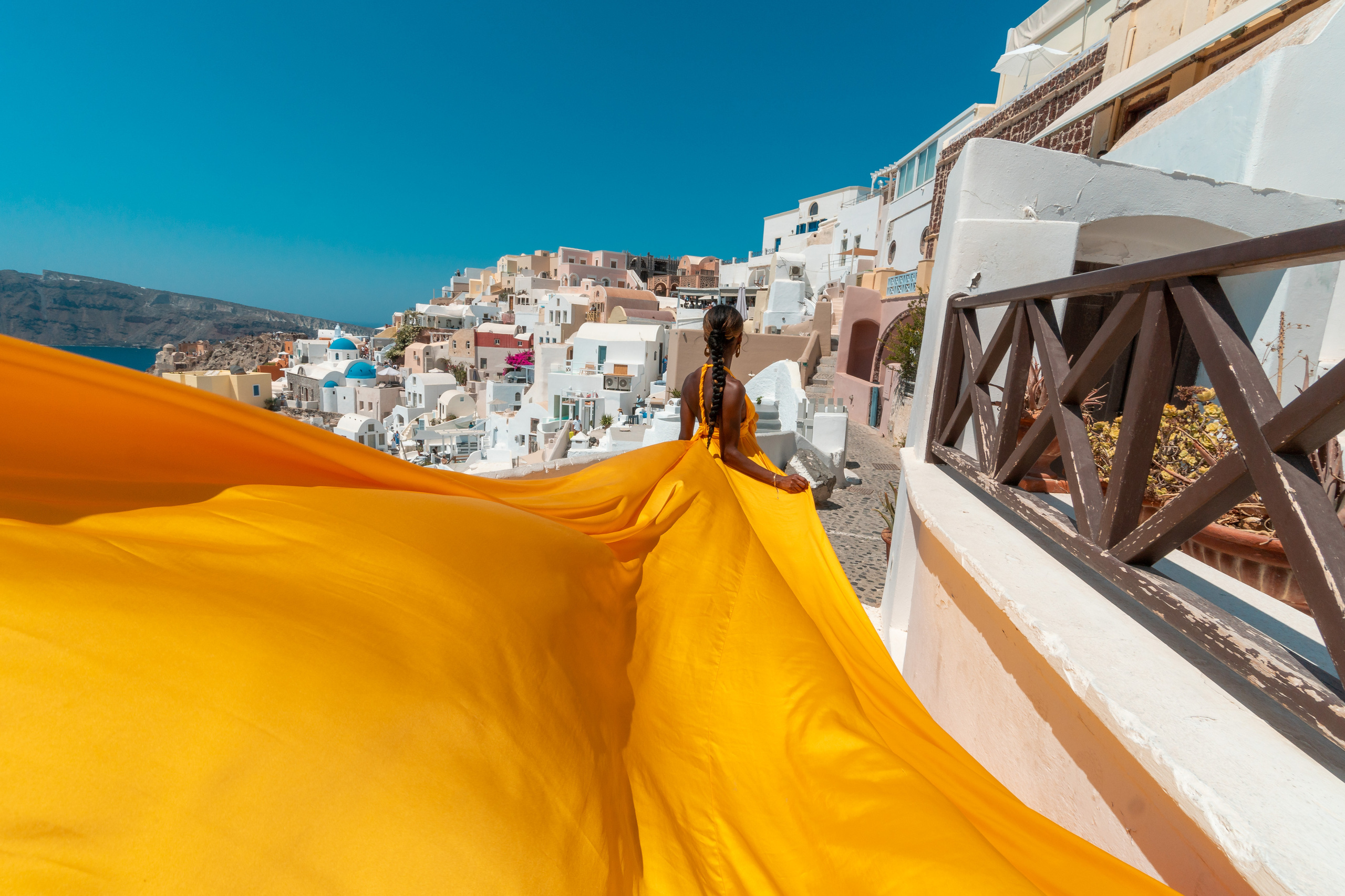 Yellow Flying Dress — Rent for Photoshoots in Santorini — Stunning Flowing Gown. Photographer in Santorini SokoLOVE Alex| Flying Dress Santorini