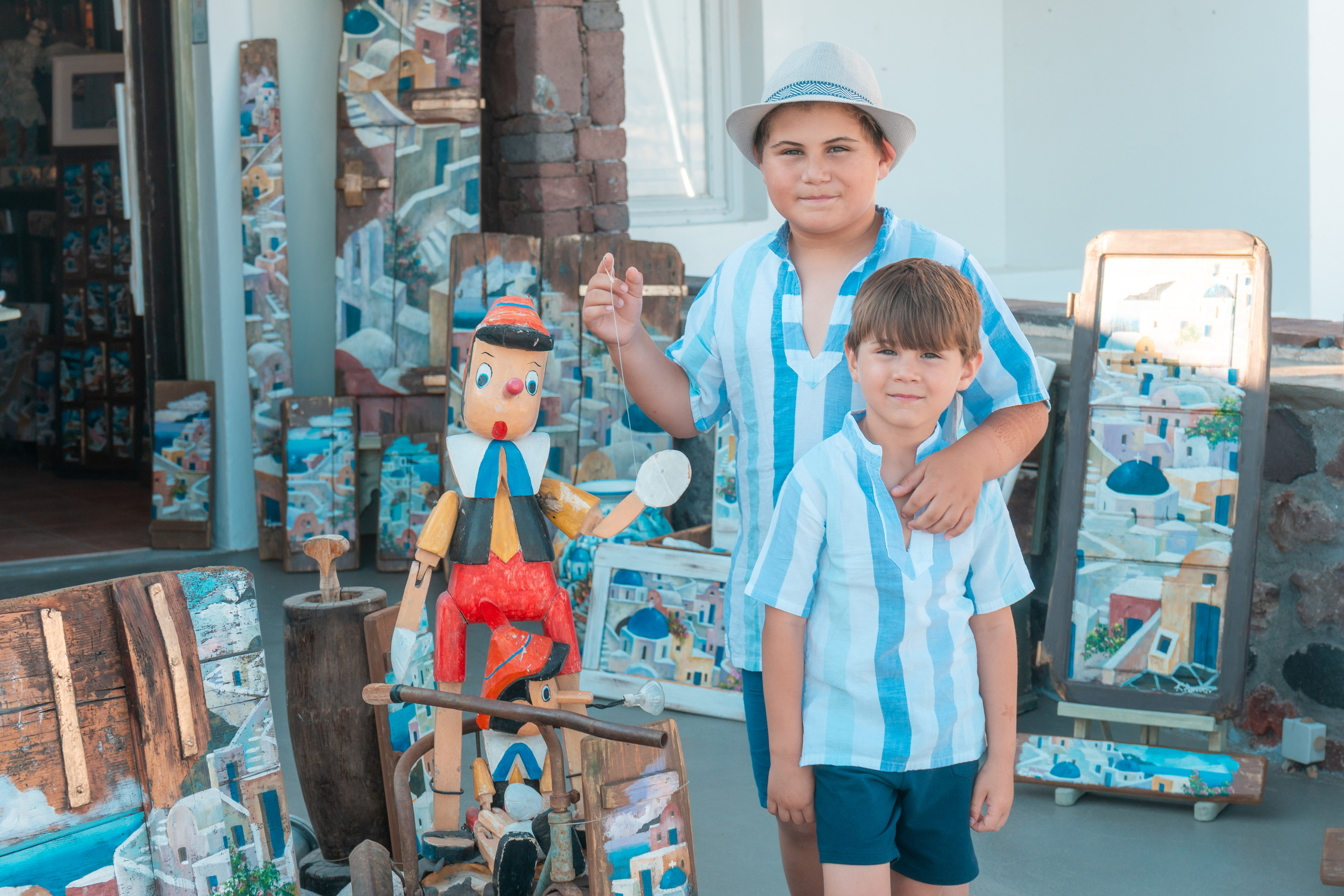 Family Photoshoot in Santorini — Unforgettable Memories for American Families. Photographer in Santorini SokoLOVE Alex| Flying Dress Santorini