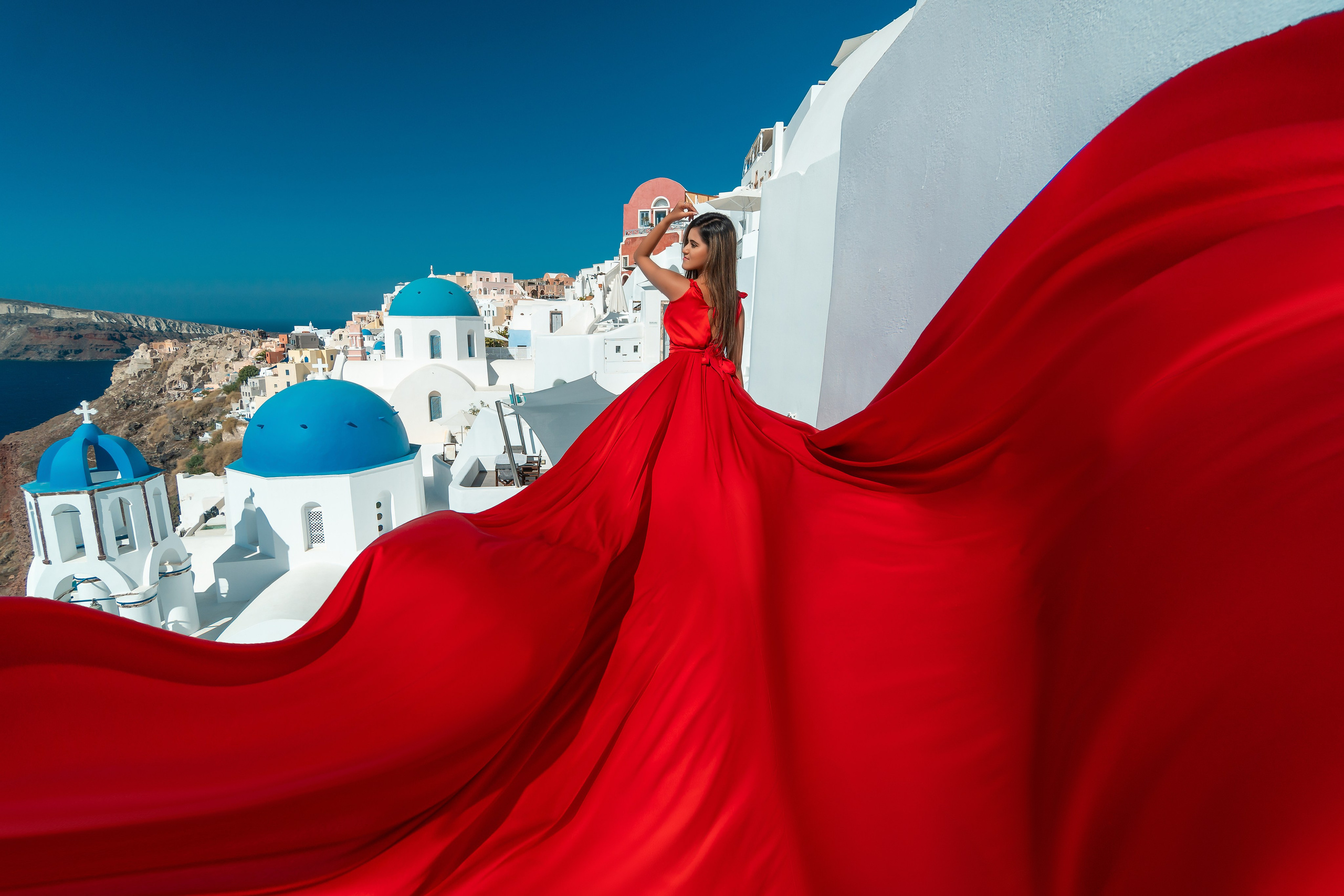 photoshooting in santorini Santorini’s Magic in Motion: Flying Dress Photoshoot with a Lovely Couple from India Oia, Santorini 10-11 am