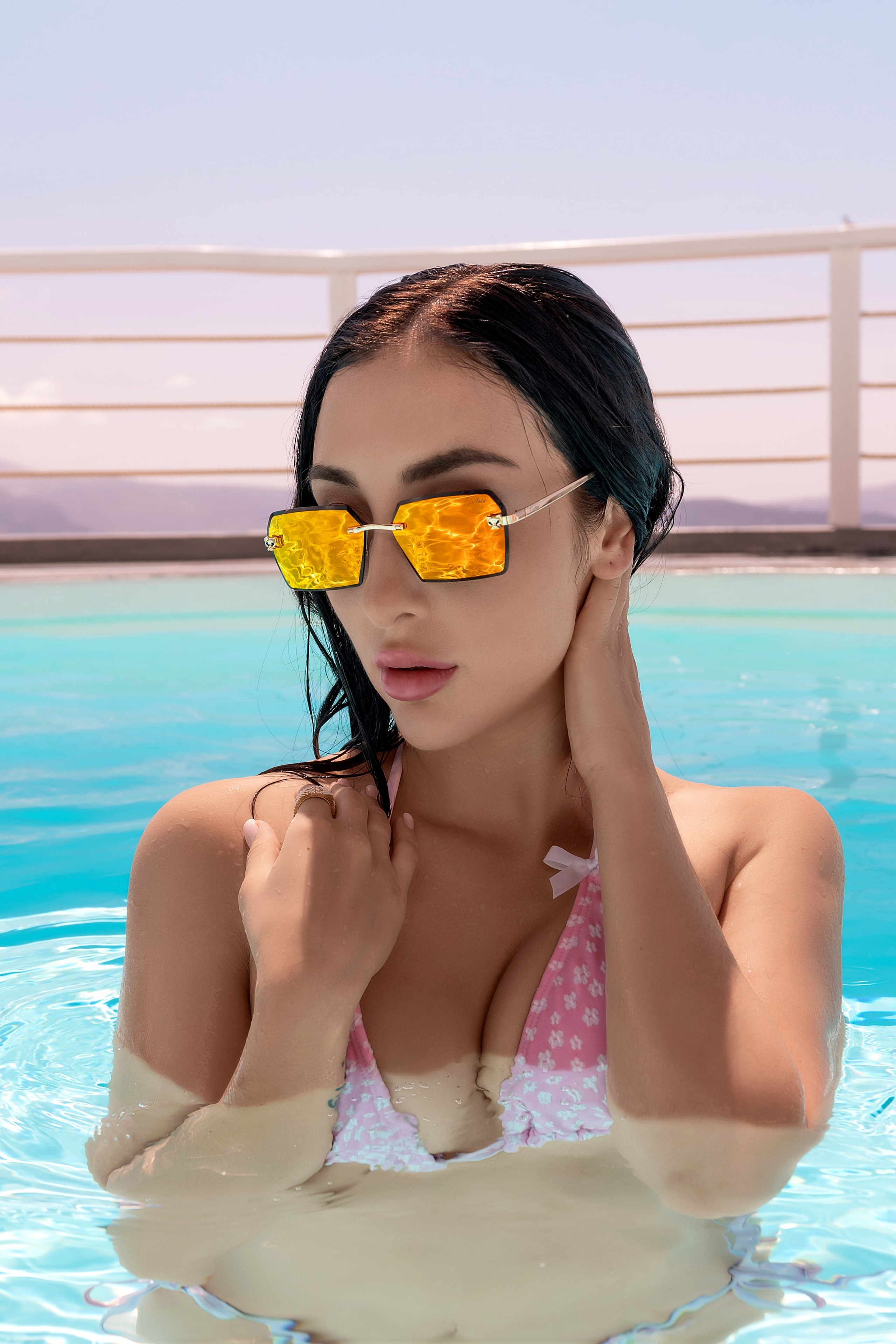 A pool photoshoot in Santorini by Sokolove offers the ultimate combination of beauty, elegance, and luxury. The tranquil waters and iconic island scenery create a dreamlike backdrop for capturing your best moments in style.