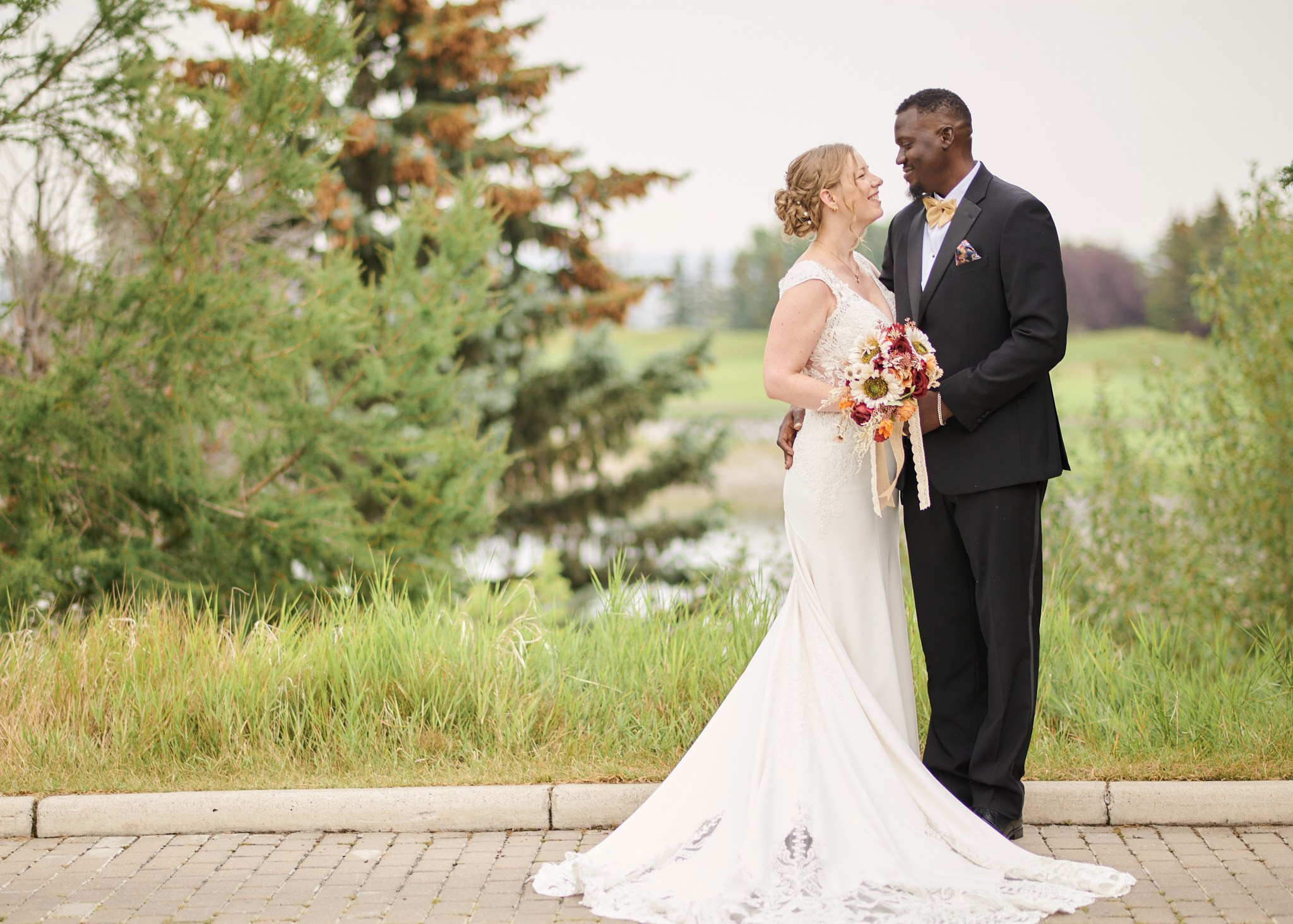 Femi & Jen. Calgary wedding photo and video. Photographer Andrii Bielikov