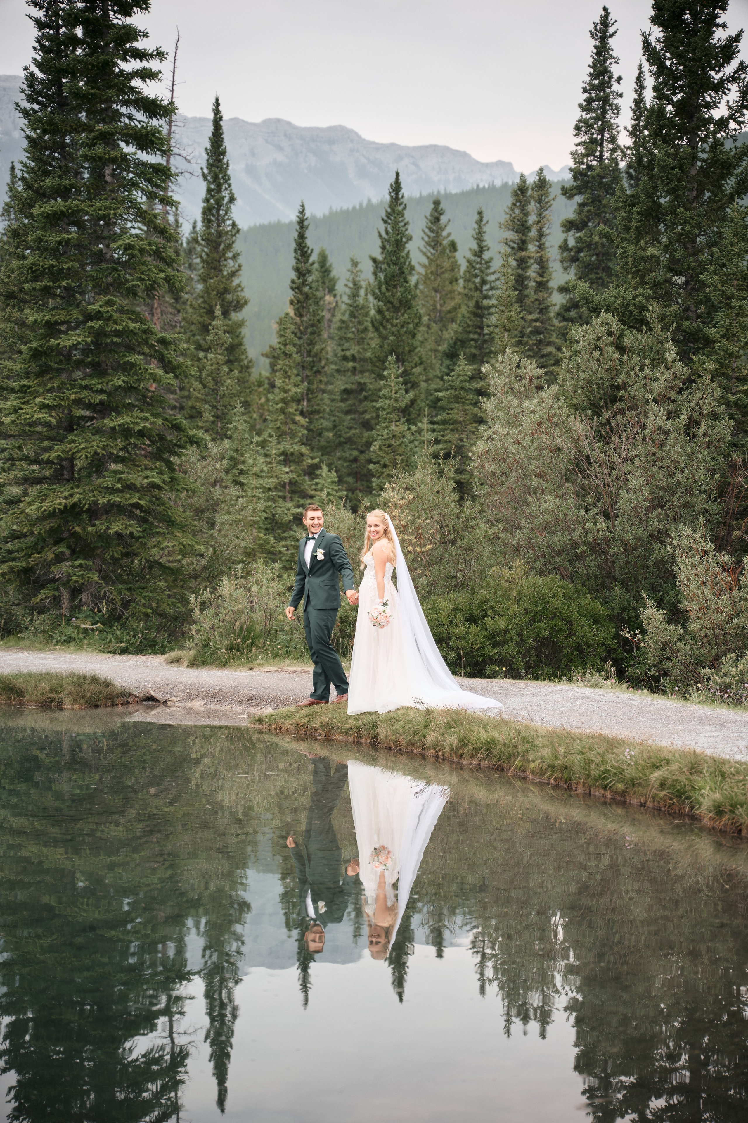 Natalie&Mat. A small, intimate wedding at Forgetmenot Lake, Kananaskis Park. Calgary wedding photo and video. Photographer Andrii Bielikov