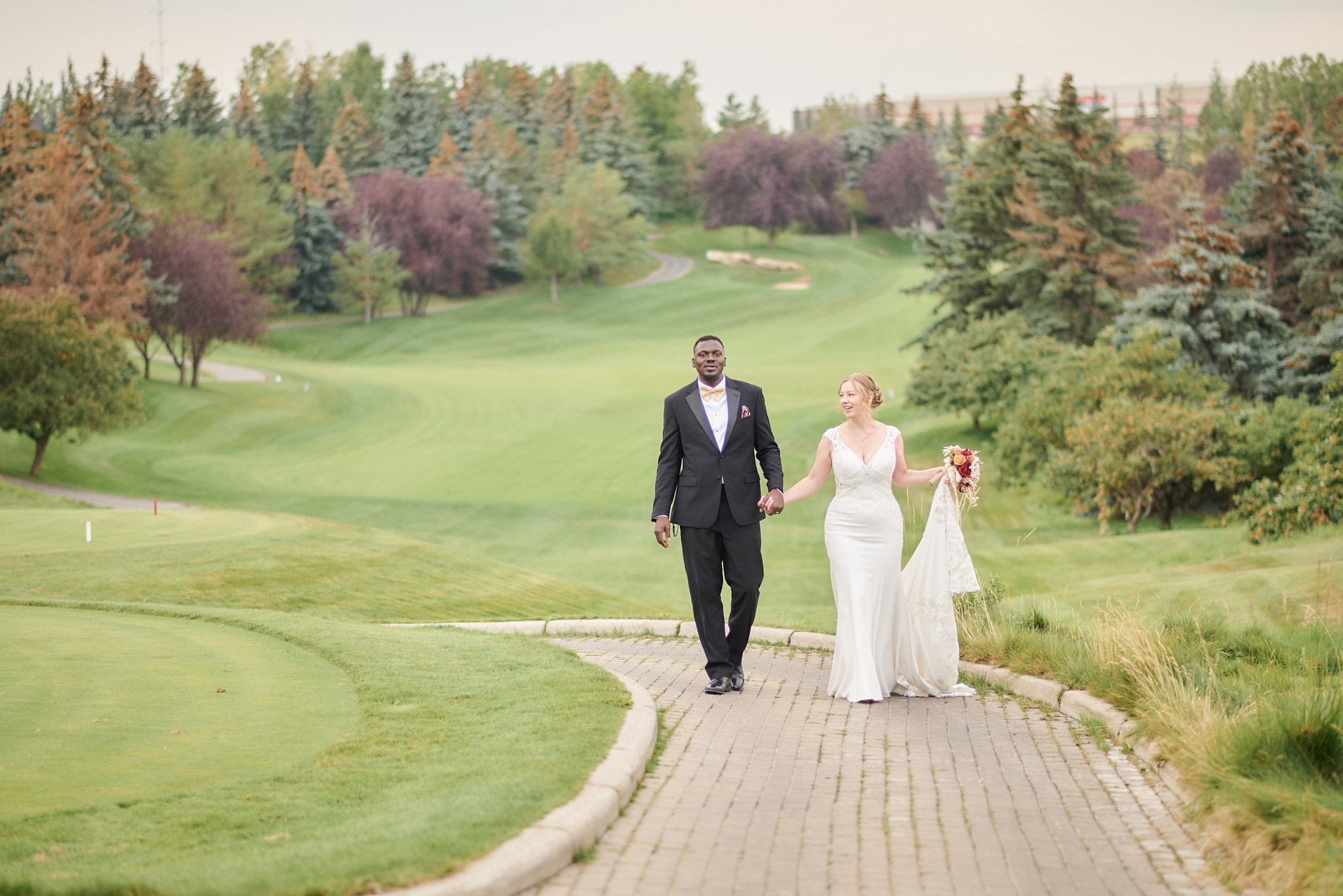 Femi & Jen. Calgary wedding photo and video. Photographer Andrii Bielikov