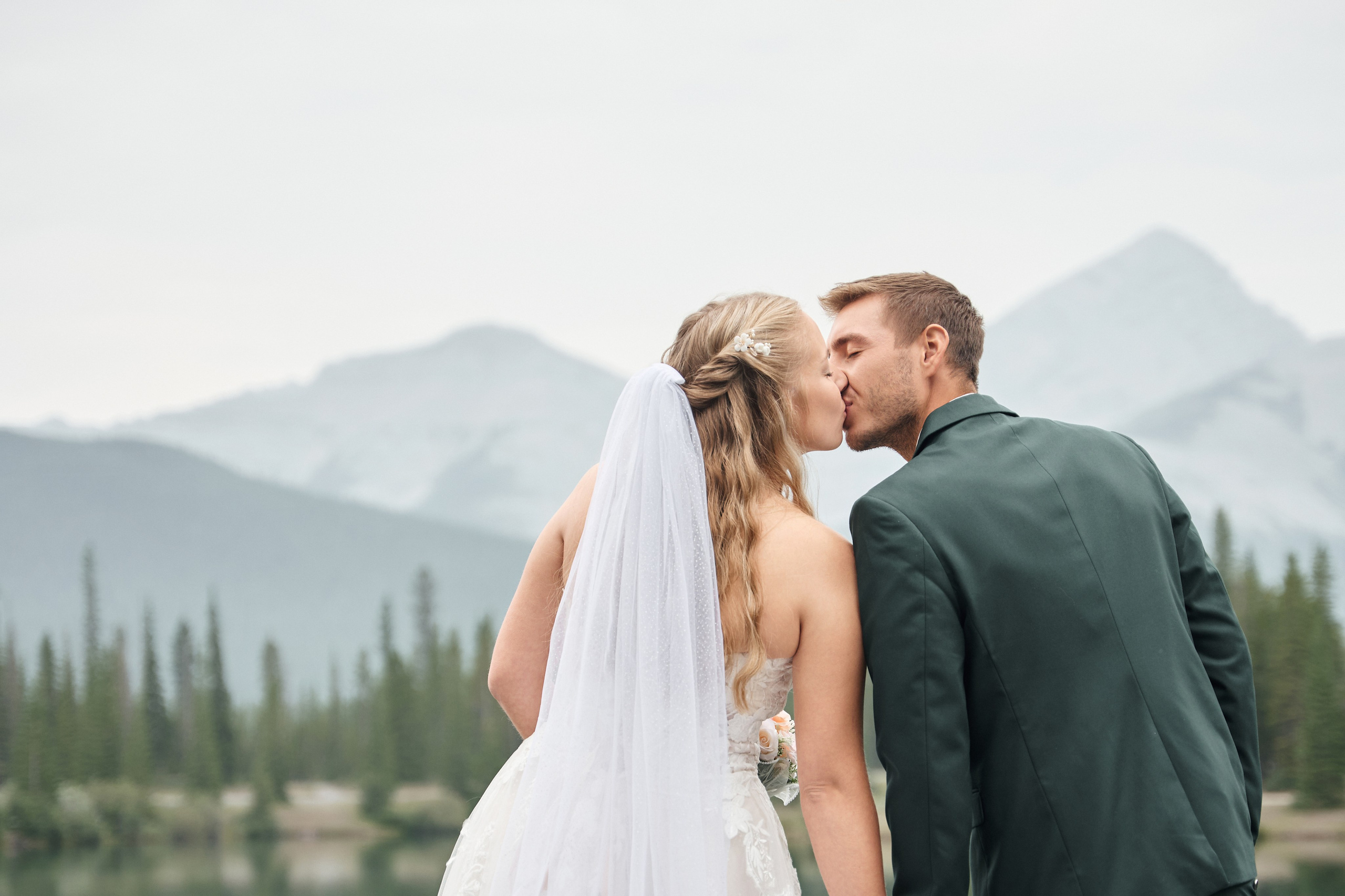 Natalie&Mat. A small, intimate wedding at Forgetmenot Lake, Kananaskis Park. Calgary wedding photo and video. Photographer Andrii Bielikov