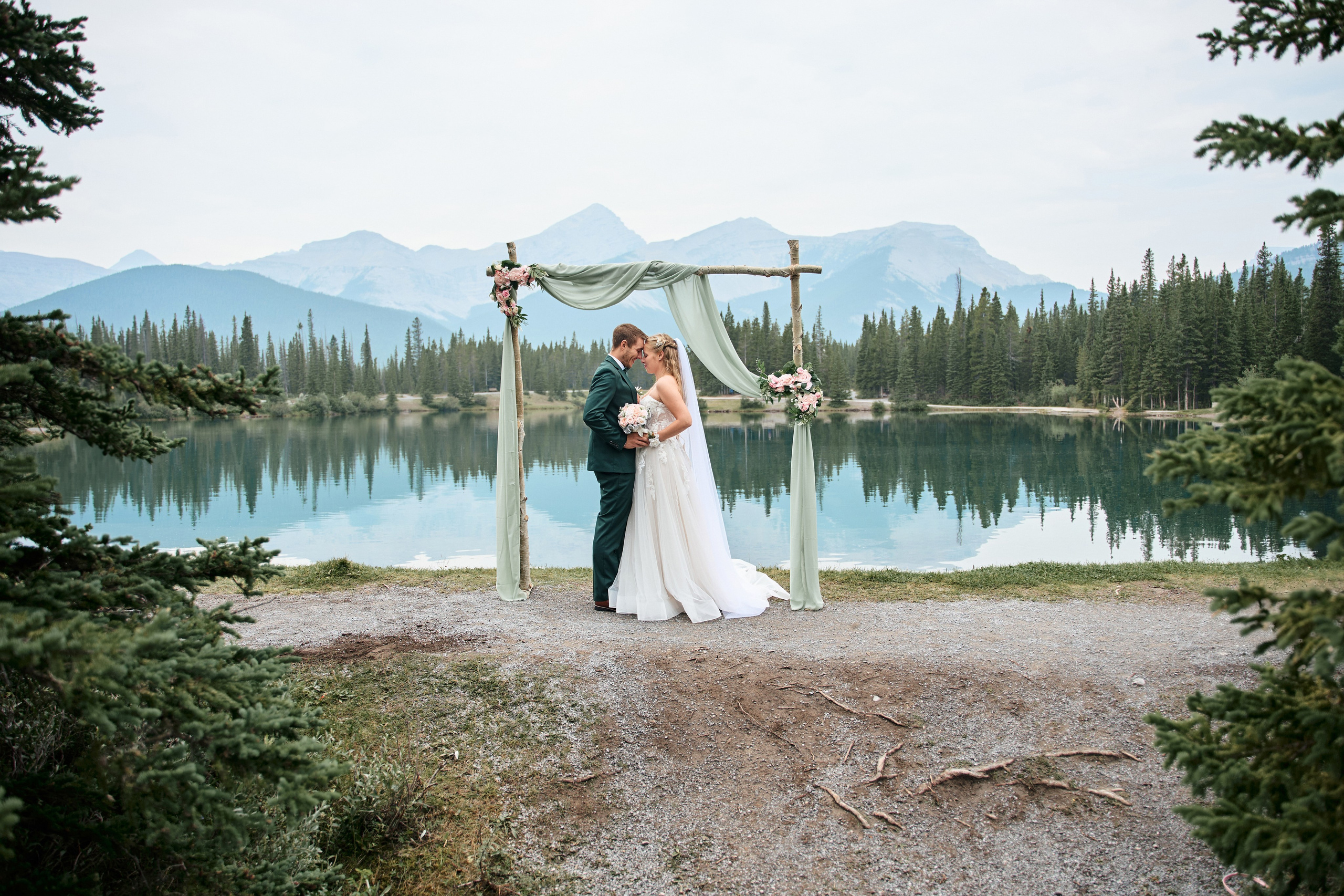 Natalie&Mat. A small, intimate wedding at Forgetmenot Lake, Kananaskis Park. Calgary wedding photo and video. Photographer Andrii Bielikov