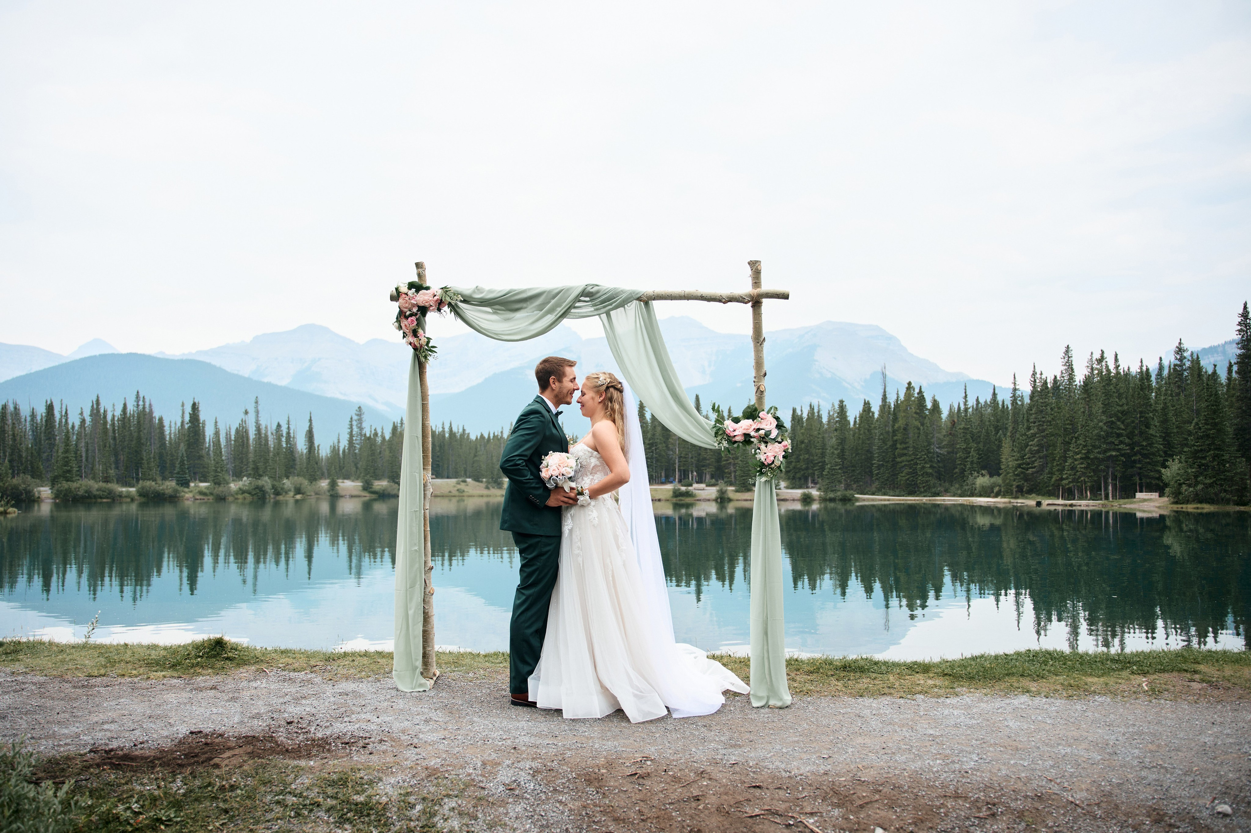 Natalie&Mat. A small, intimate wedding at Forgetmenot Lake, Kananaskis Park. Calgary wedding photo and video. Photographer Andrii Bielikov