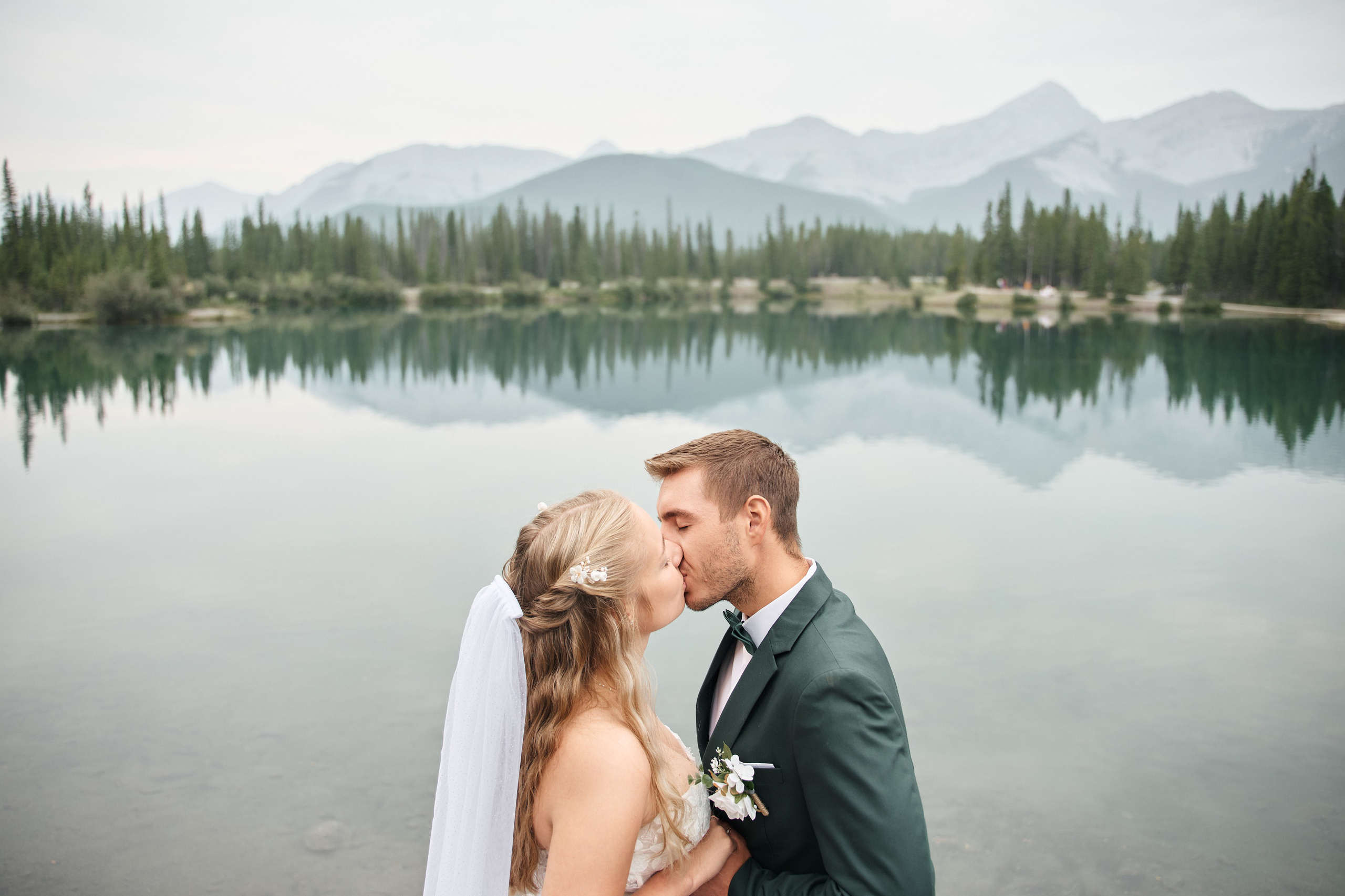 Natalie&Mat. A small, intimate wedding at Forgetmenot Lake, Kananaskis Park. Calgary wedding photo and video. Photographer Andrii Bielikov