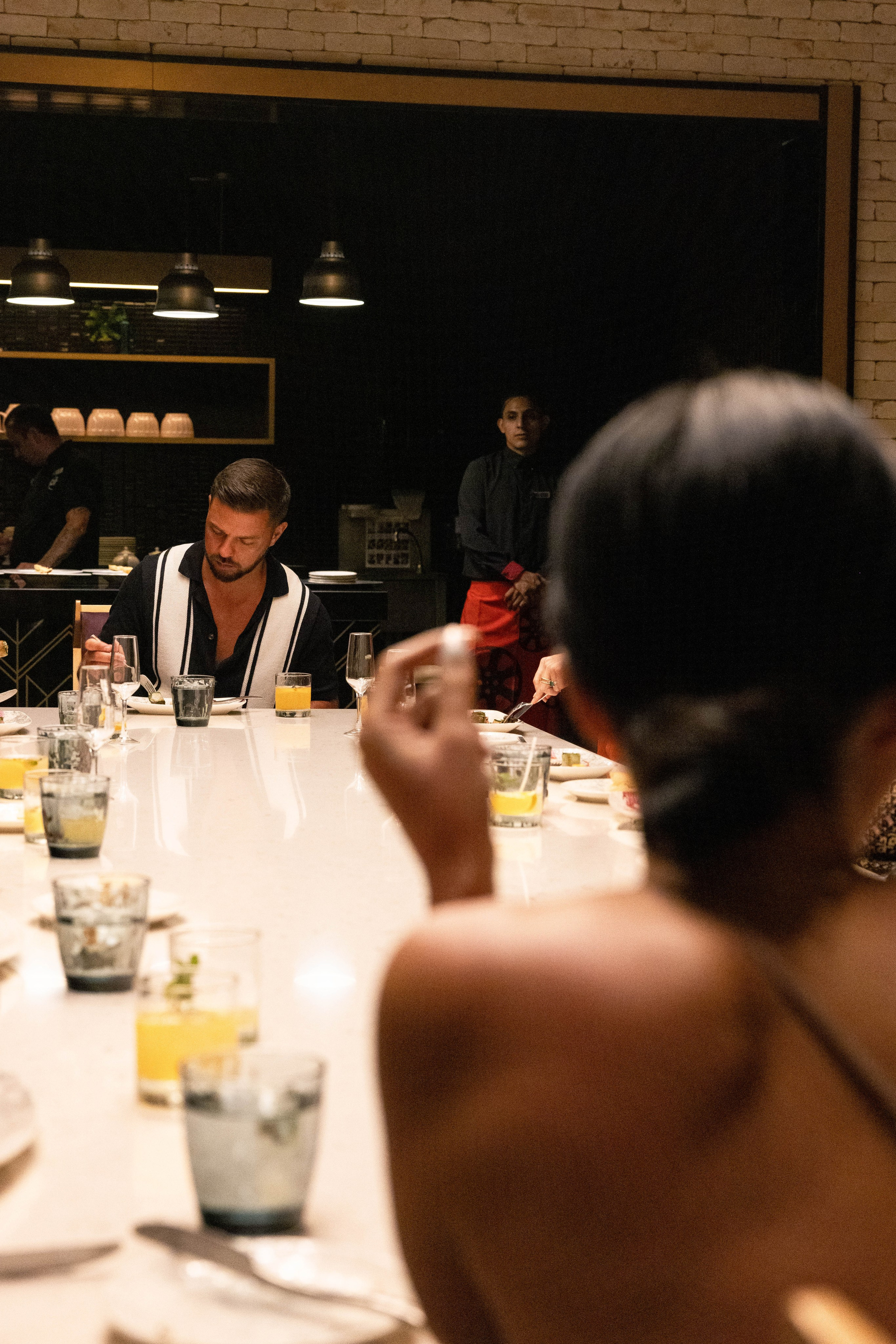 Bride sharing a moment during pre-wedding celebration in Cancun.